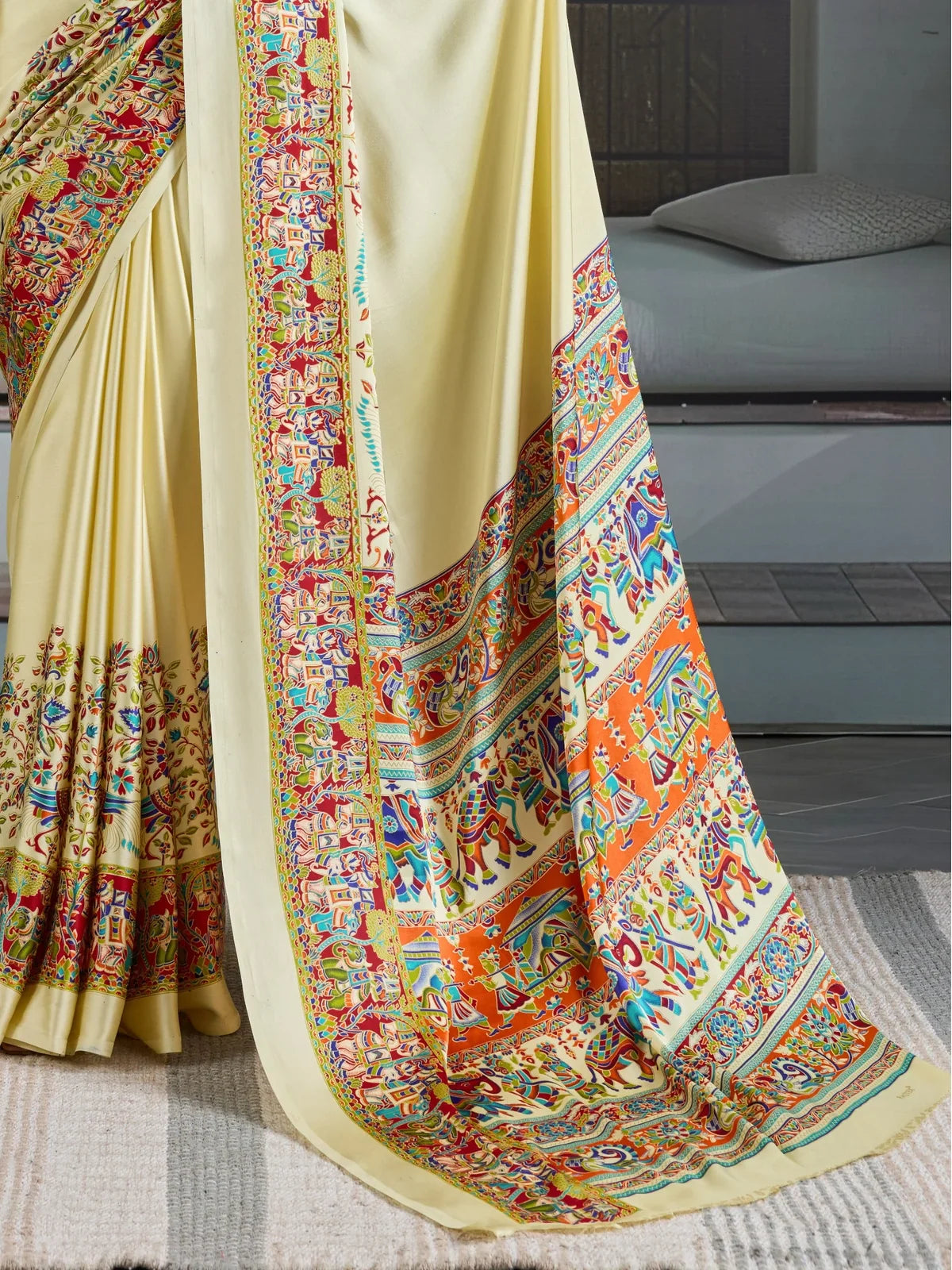 Tarani modal satin saree pallu with multicolor Ajrakh artwork and orange contrast border