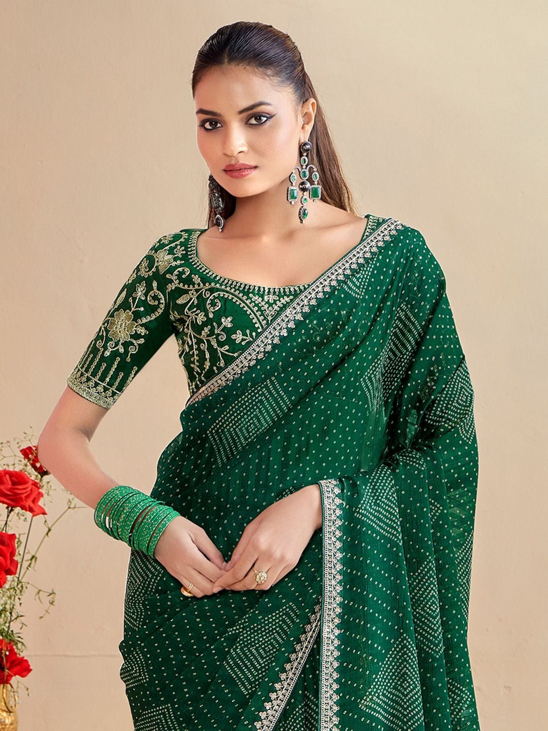 Tarani upper body view of green moss chiffon silk saree with embroidered blouse
