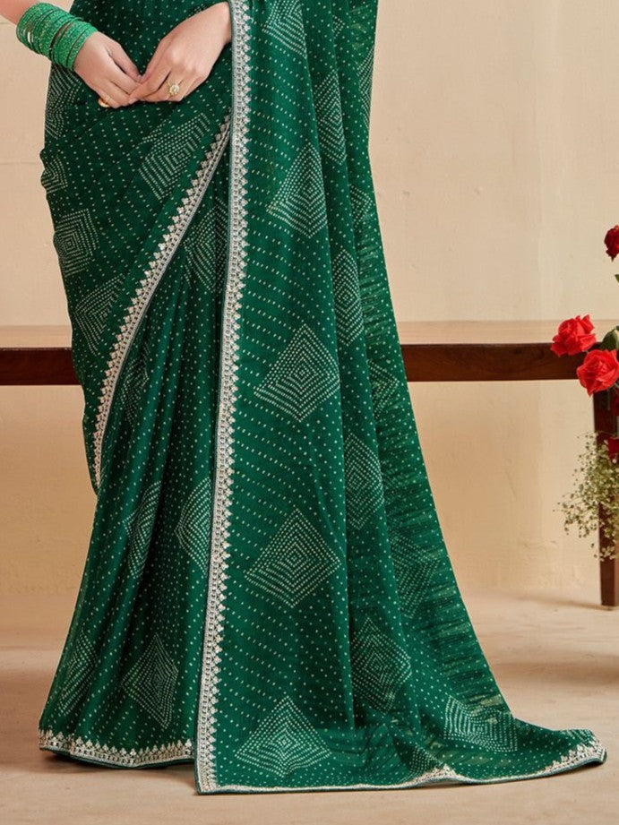 Tarani pallu view of green moss chiffon silk saree with intricate border work