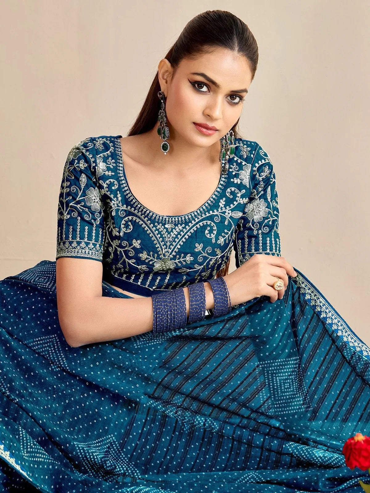 Tarani close-up blouse embroidery in teal moss chiffon silk saree