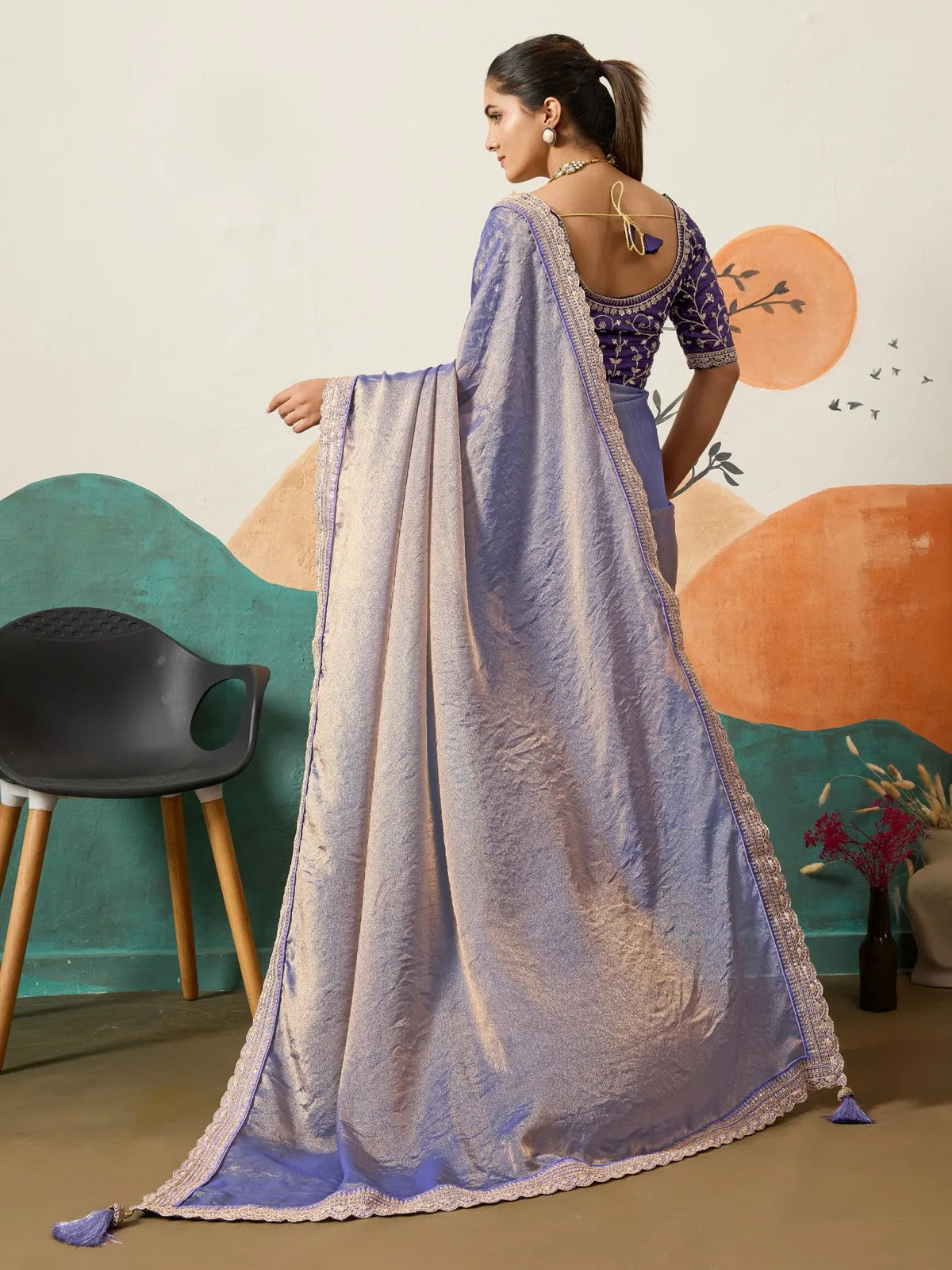 Tarani lavender wedding saree with flowing pallu and back blouse design back view