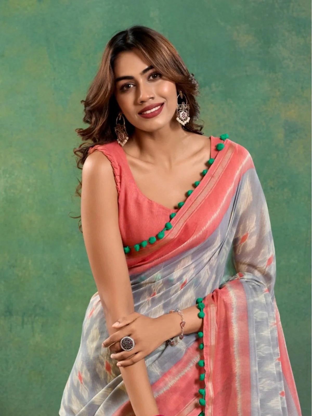 Tarani mul mul cotton saree upper body view highlighting elegant peach blouse and soft drape