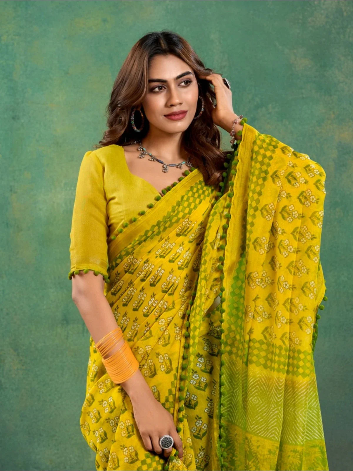 Tarani yellow mul mul cotton saree upper body view highlighting blouse and pallu details