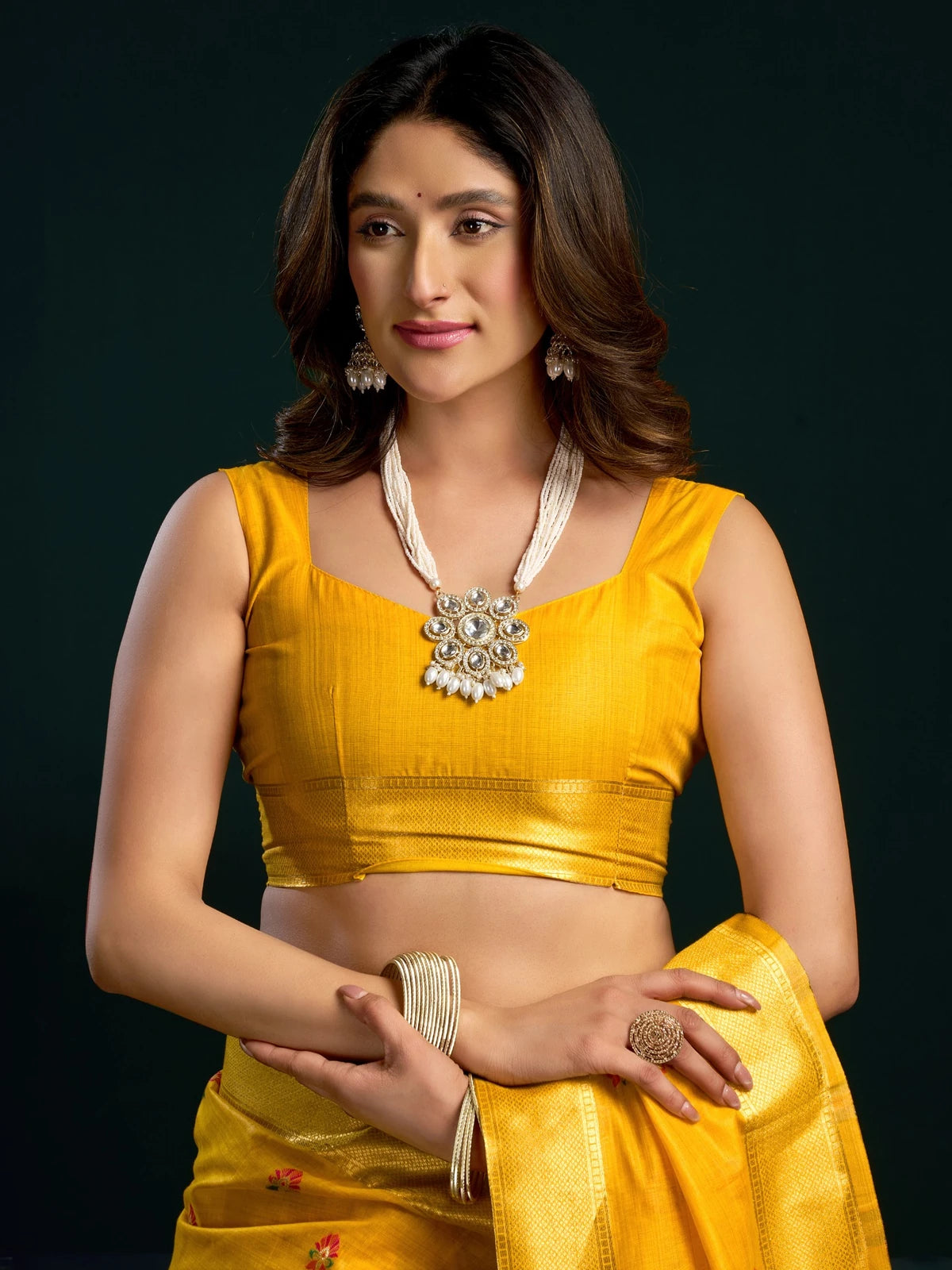 Tarani Pavani mustard Munga Cotton Mina Work saree with zari border upper body view