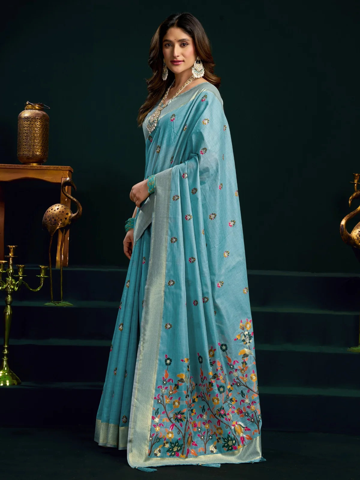 Tarani sky blue Munga Cotton Mina Work saree side view with elegant floral pallu