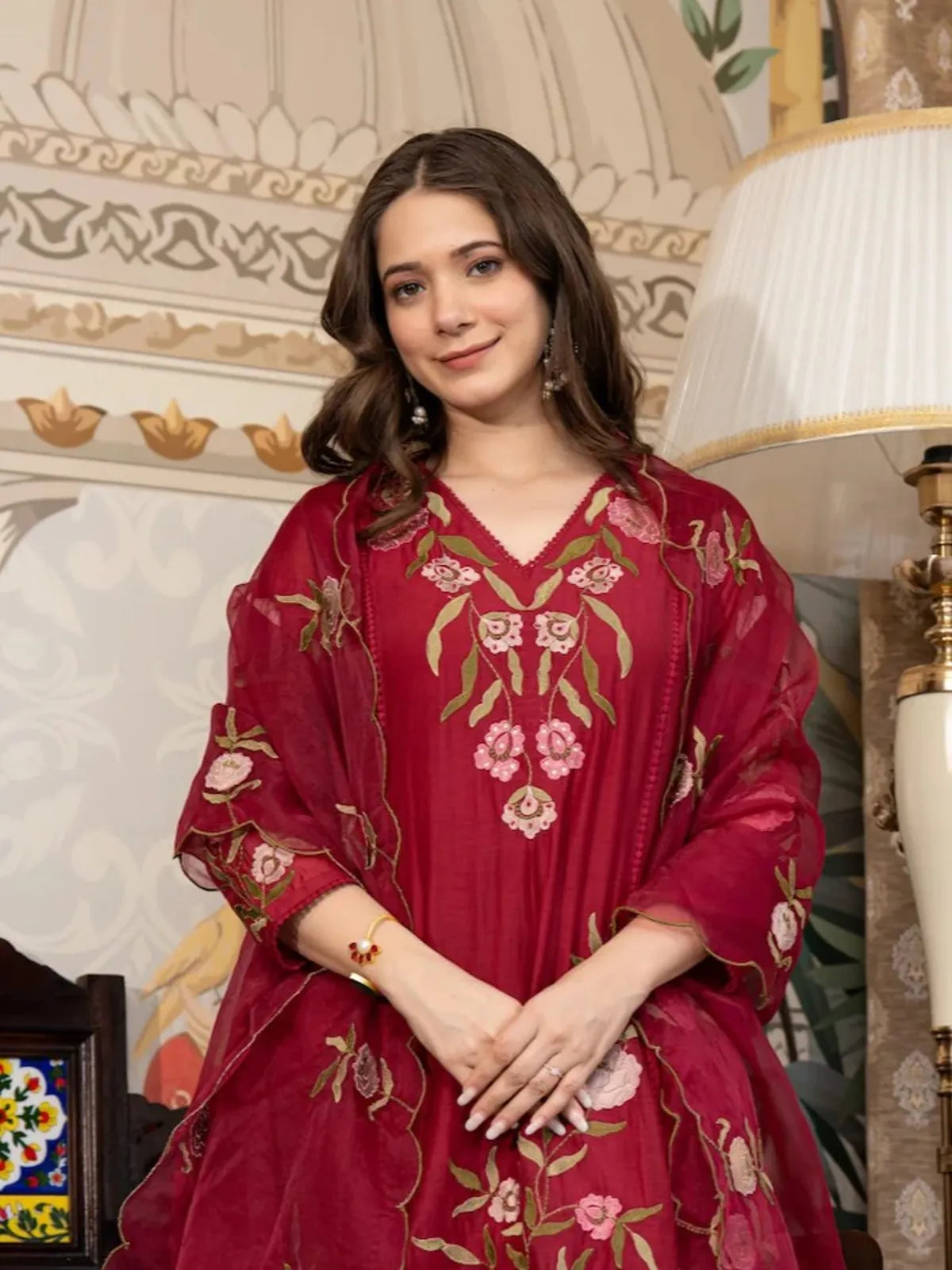 Tarani maroon muslin embroidered dress with neckline floral detailing upper body view