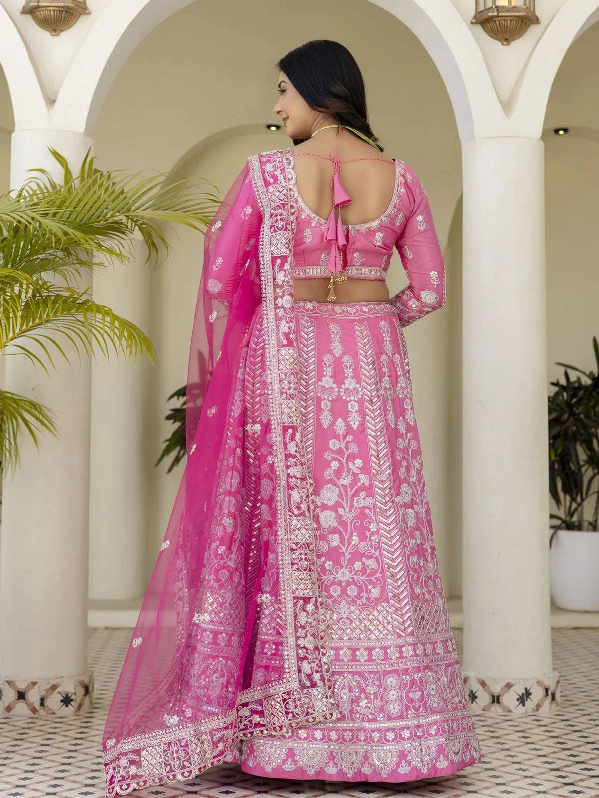Tarani pink lehenga with elegant back blouse design and full embroidery view