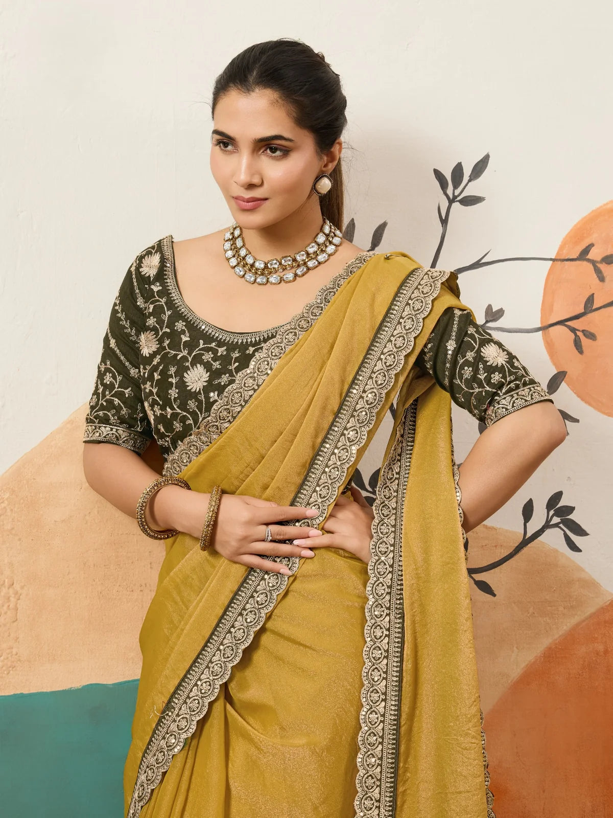 Tarani mustard wedding saree front view with sequence work blouse and festive drape