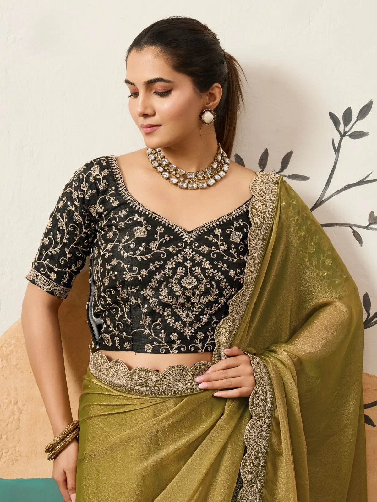 Tarani olive green party wear saree with sequins blouse upper body view