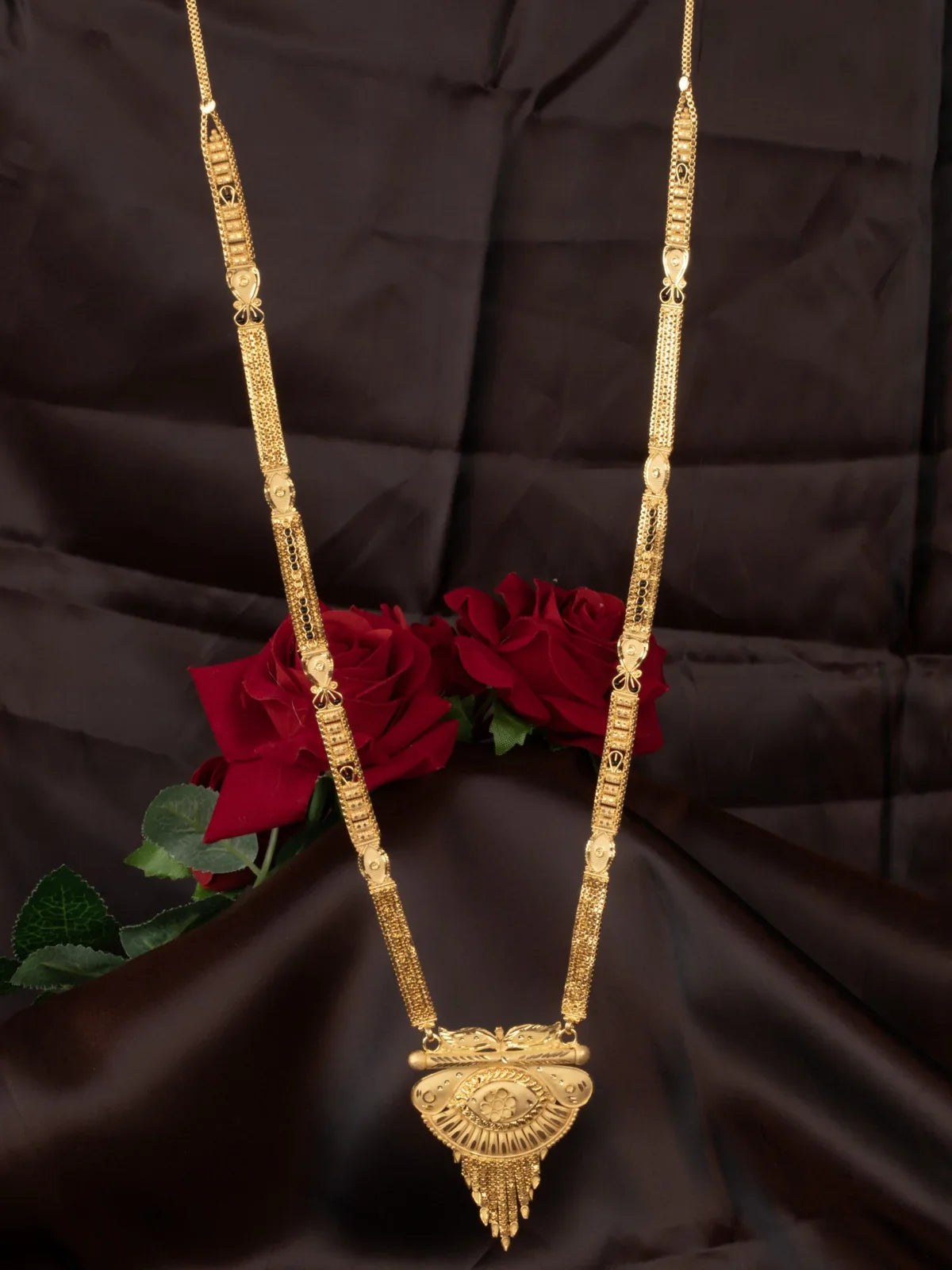 Tarani designer gold plated necklace with antique detailing for weddings