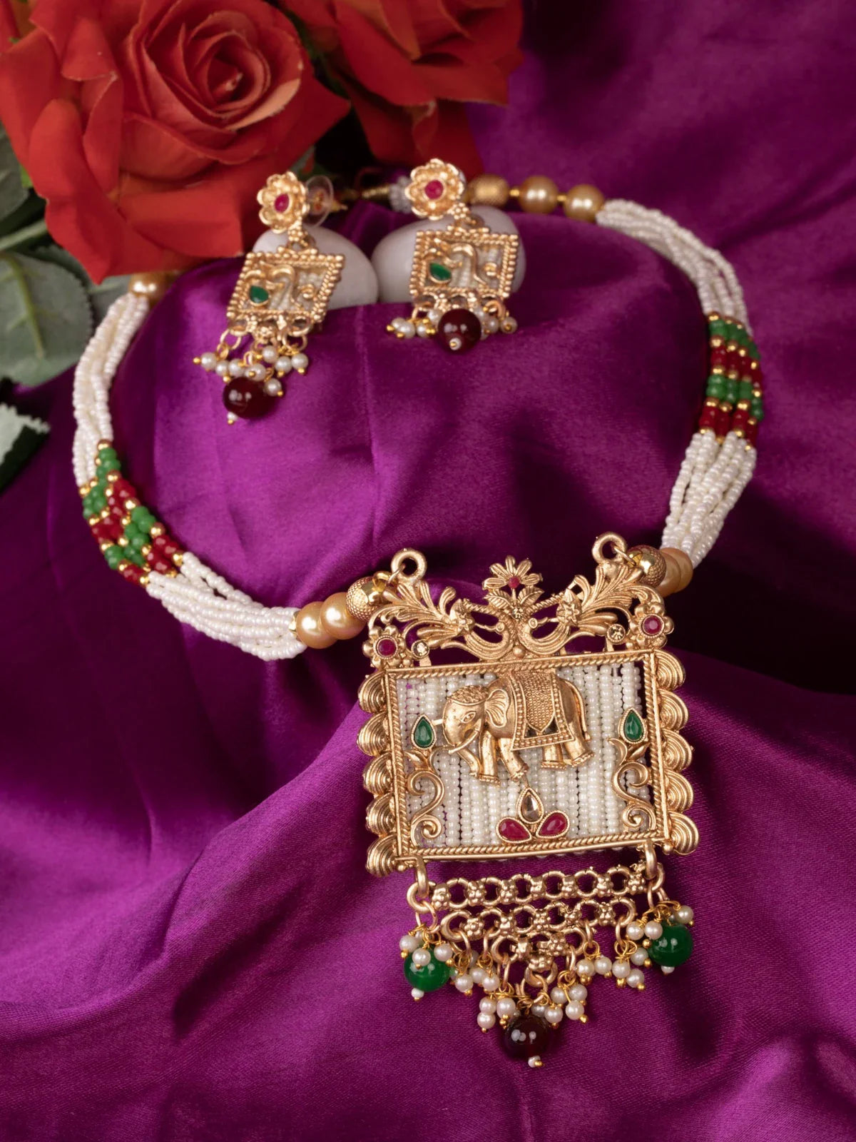 Tarani gold plated necklace set with elephant motif and matching earrings for wedding and festive wear