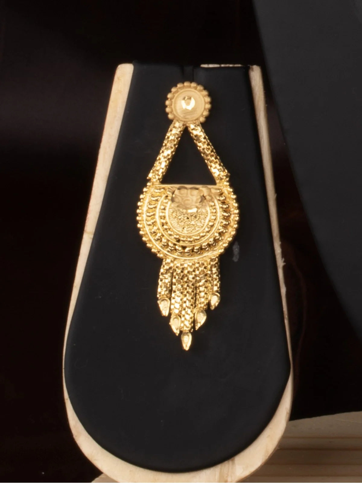 Tarani gold plated earring view from necklace set with intricate floral work for weddings