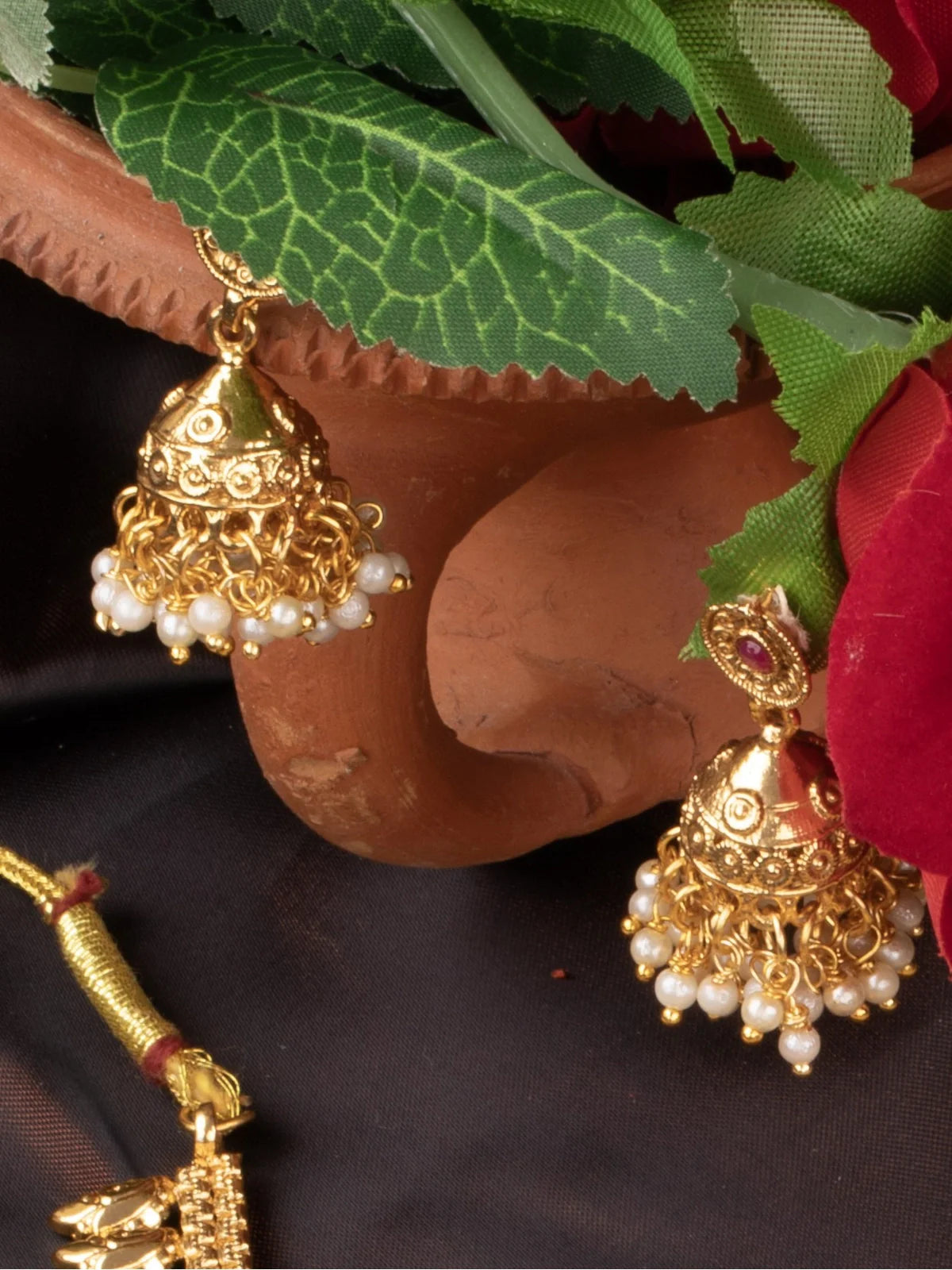Tarani complete necklace and earrings set styled with pearls for weddings and gifting