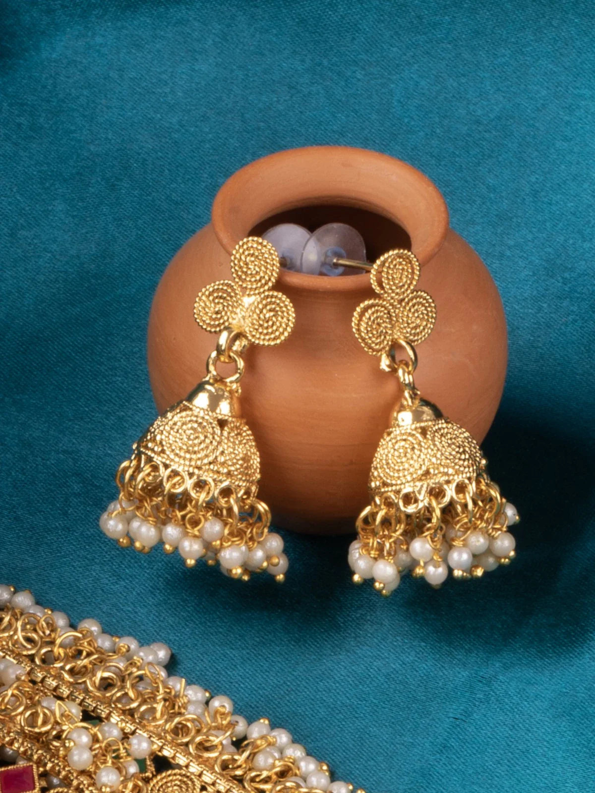 Tarani earrings from gold plated necklace set with pearl drops for festive occasions
