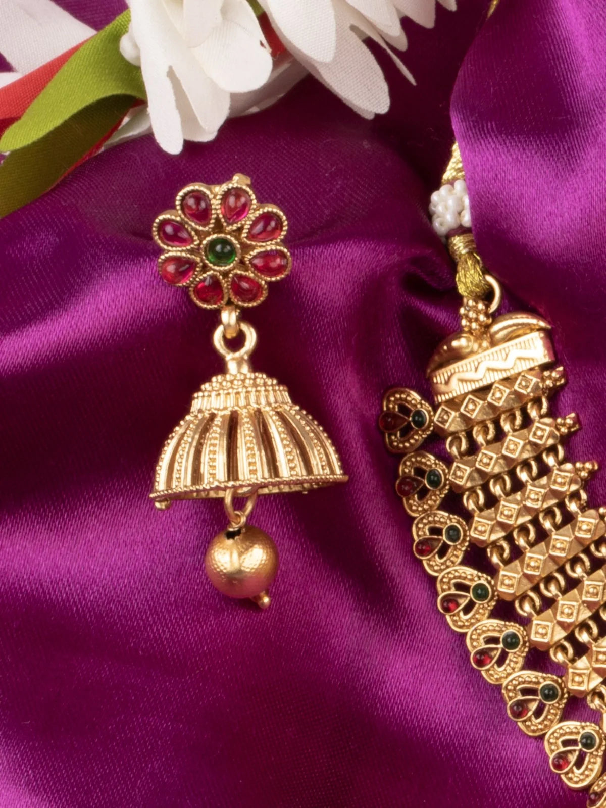 Tarani gold plated necklace set earring-view with intricate red and green stone detailing