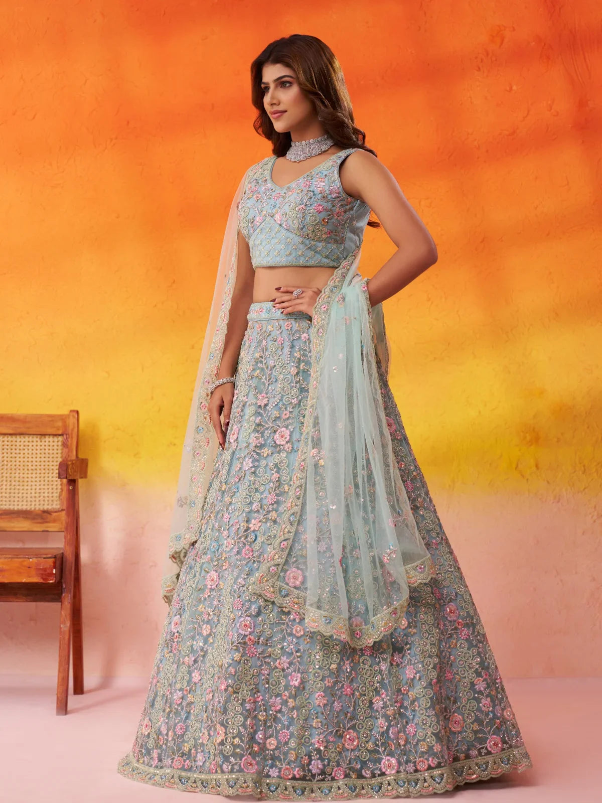 Tarani beige net lehenga side view showing dupatta and intricate floral design