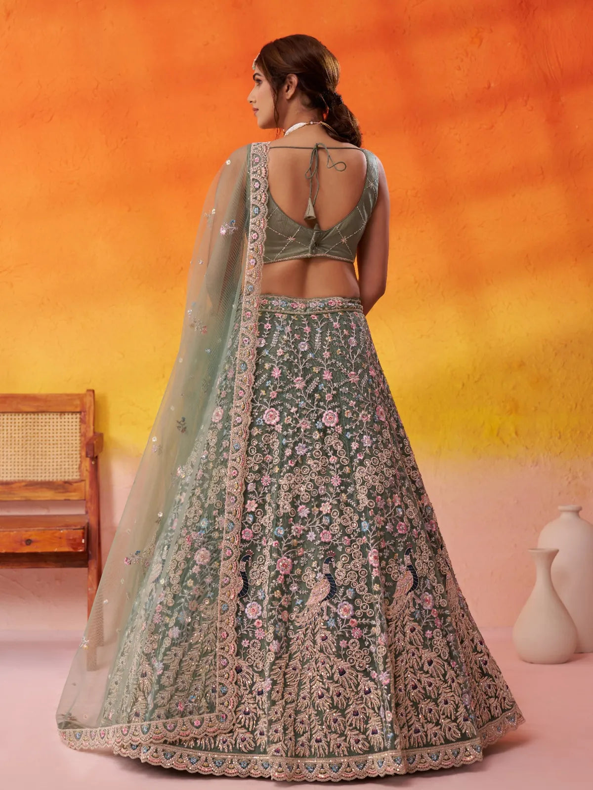 Back view of blouse and lehenga embroidery from Tarani green lehenga set