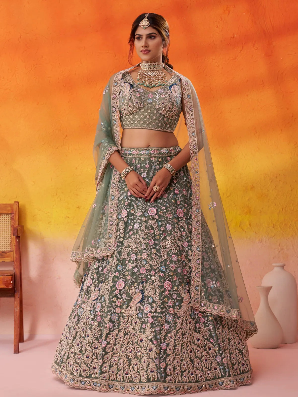 Tarani green net lehenga with sequin embroidery and floral design, front full view