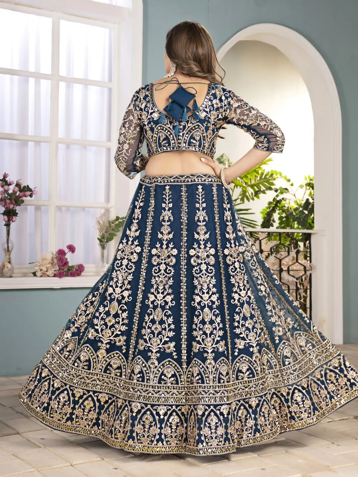 Tarani navy blue lehenga full back view with intricate embroidery design