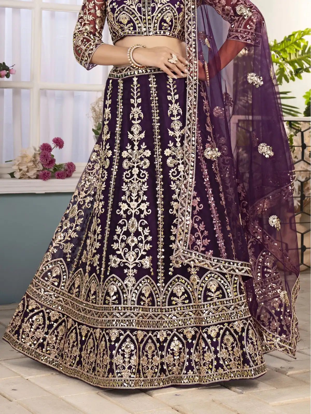 Tarani purple net lehenga closeup view of embroidery and detailing
