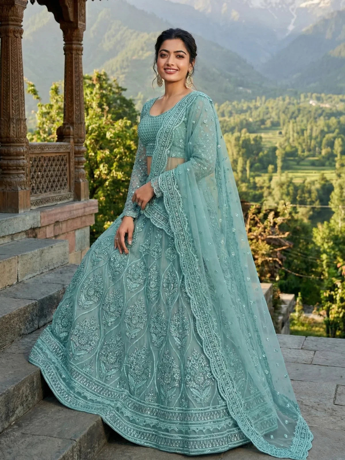 Sea green wedding lehenga in butterfly net fabric styled with dupatta – Tarani