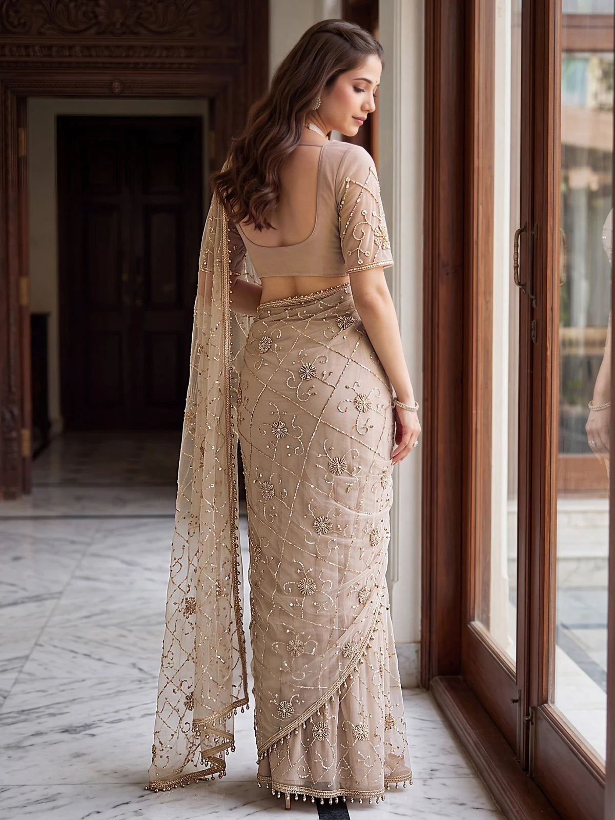 Tarani beige net saree with beads sequence pearls embroidery back-view