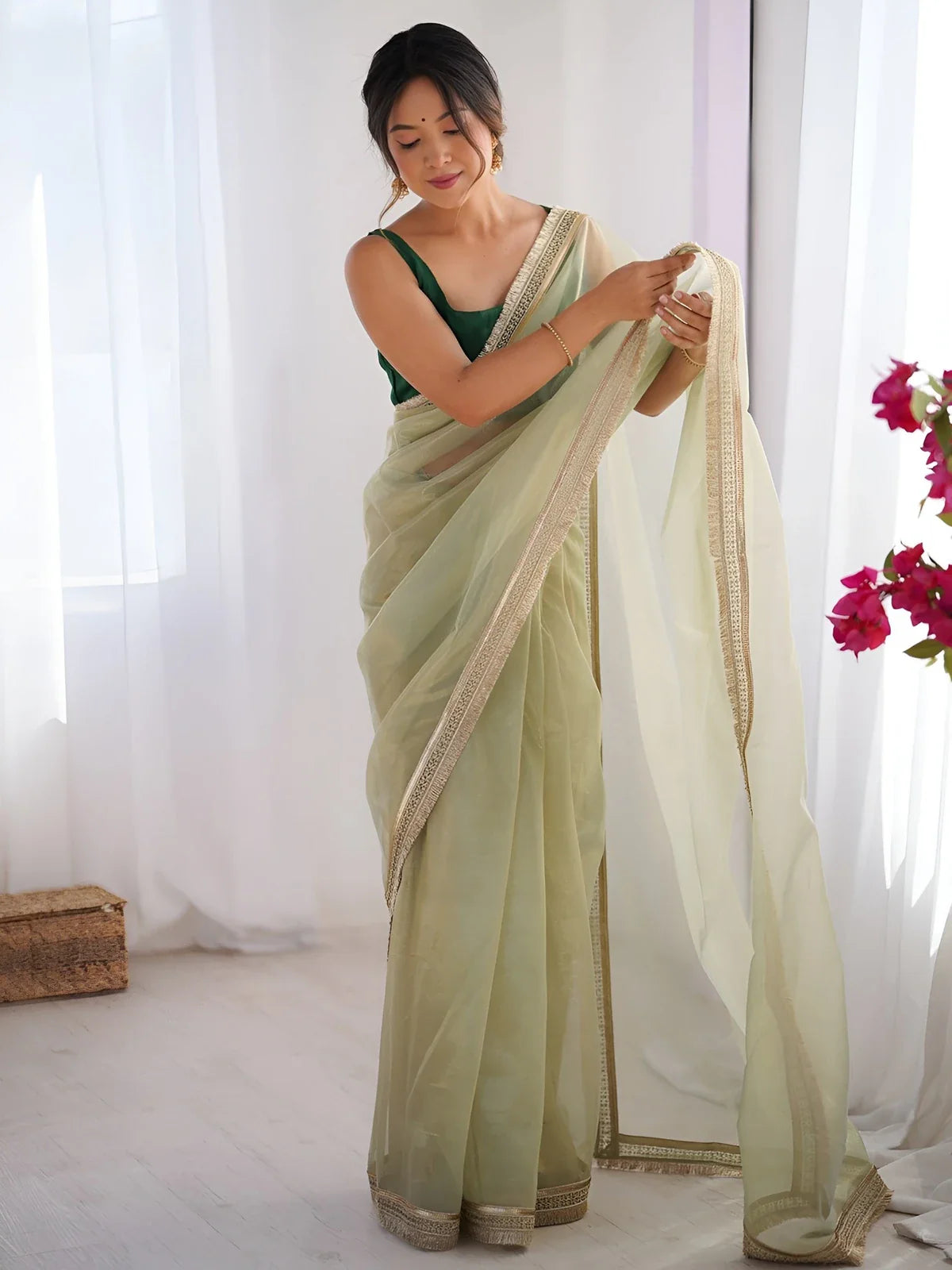 Tarani golden net saree full view with sequin border and mono blouse piece for festive parties