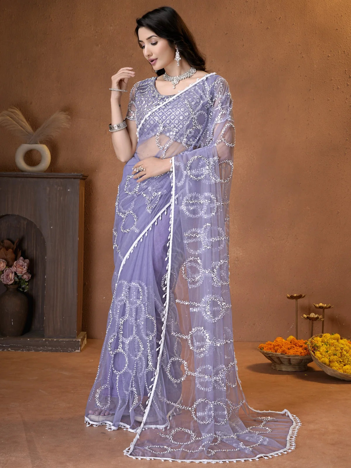 Tarani lavender net saree with beads sequins pearls embroidery back view