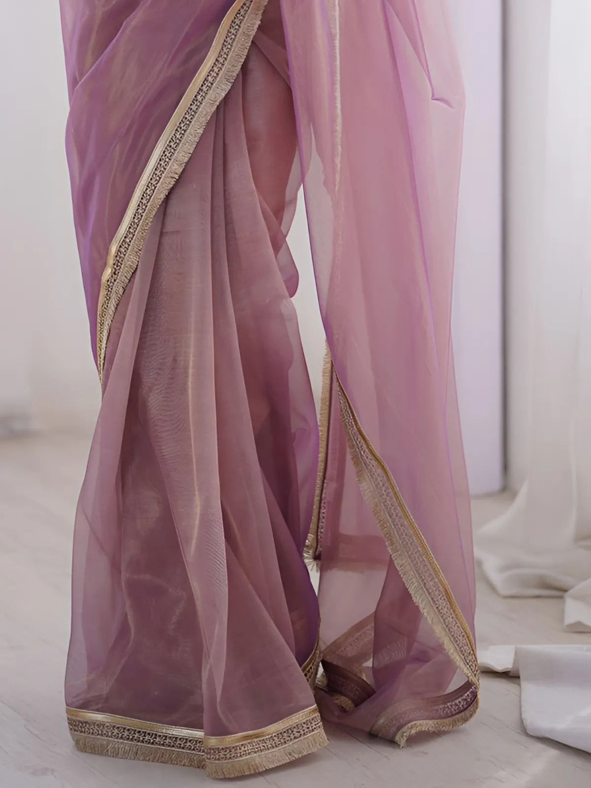 Tarani lavender dual shade net saree with golden lace – closeup fabric texture