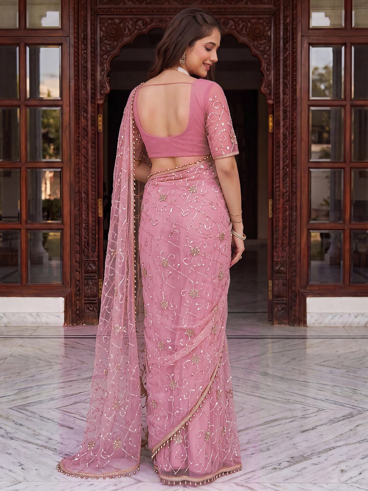Tarani pink net saree with beads sequins and pearl embroidery back-view