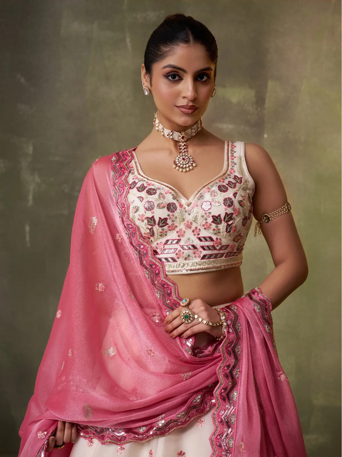 Tarani designer blouse with sweetheart neckline and embroidery closeup view