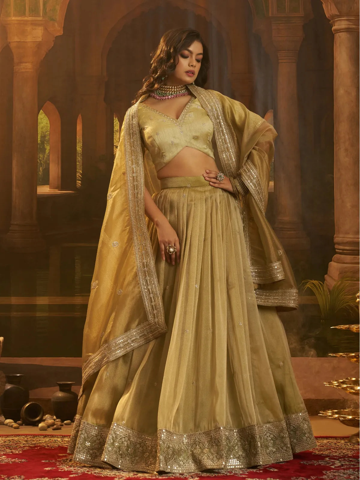 Tarani golden organza lehenga with sequins embroidery and matching blouse for weddings