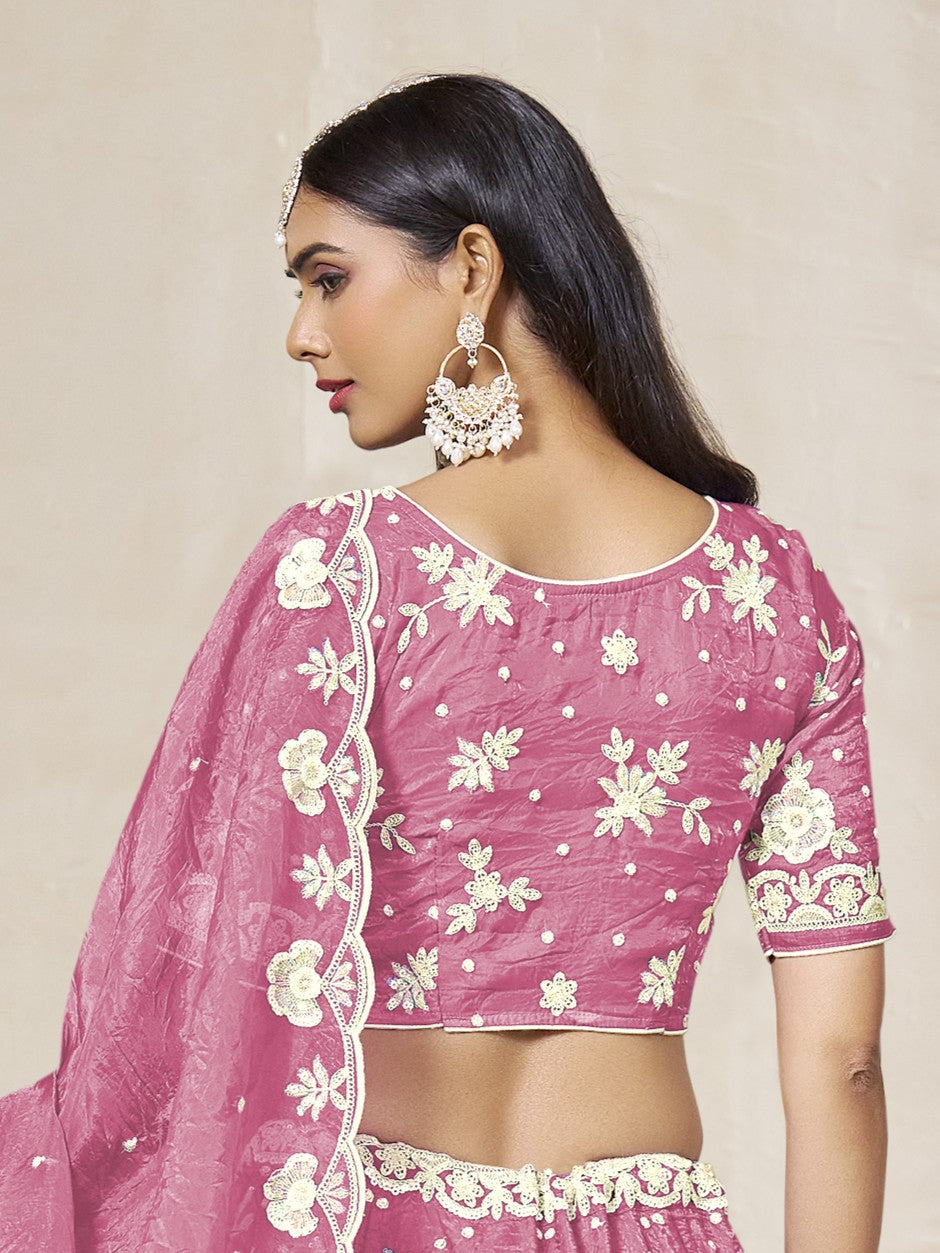 Tarani pink organza silk lehenga back view highlighting blouse and dupatta drape