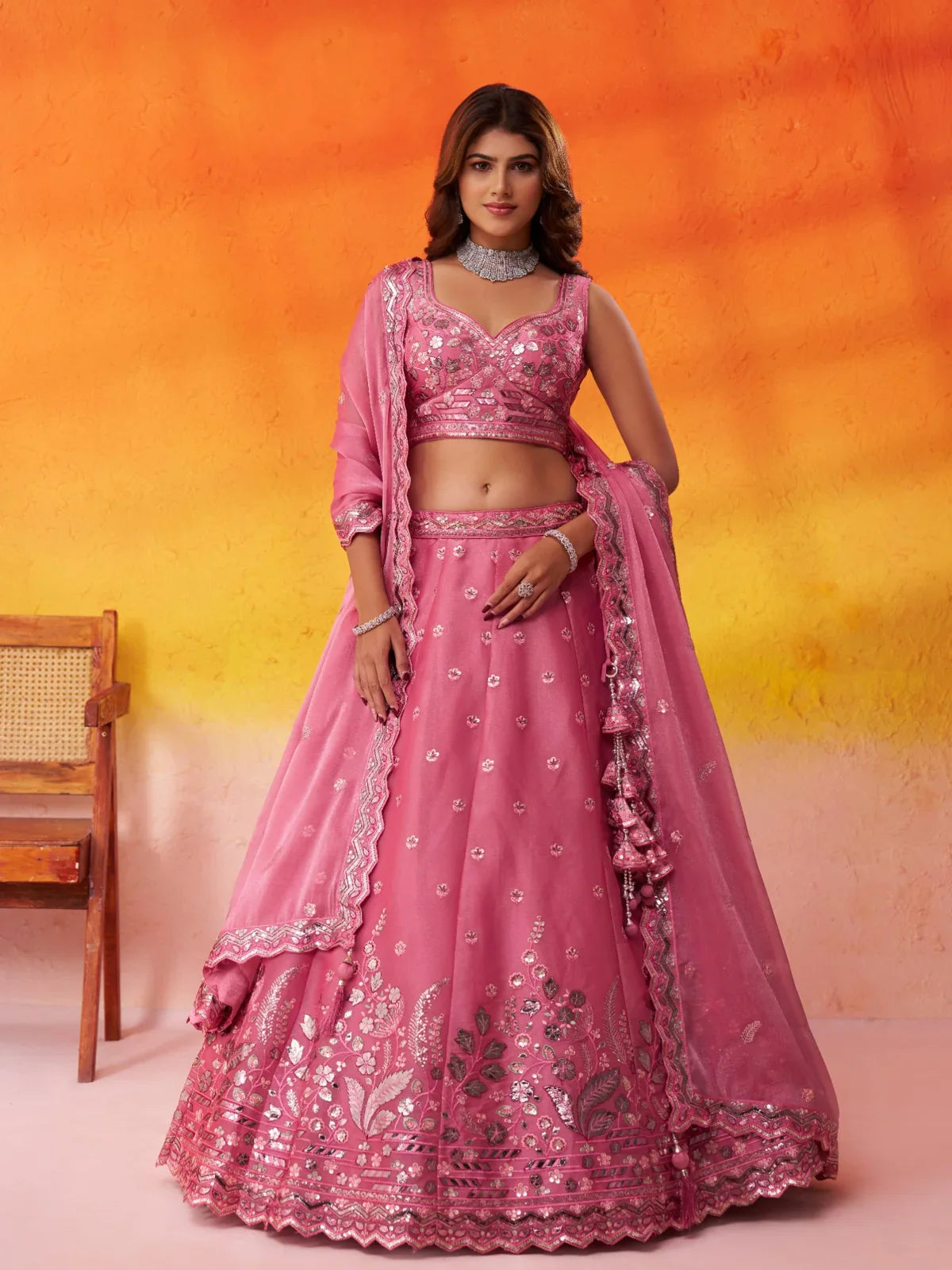 Tarani pink organza lehenga with heavy sequin and embroidery work in full front view