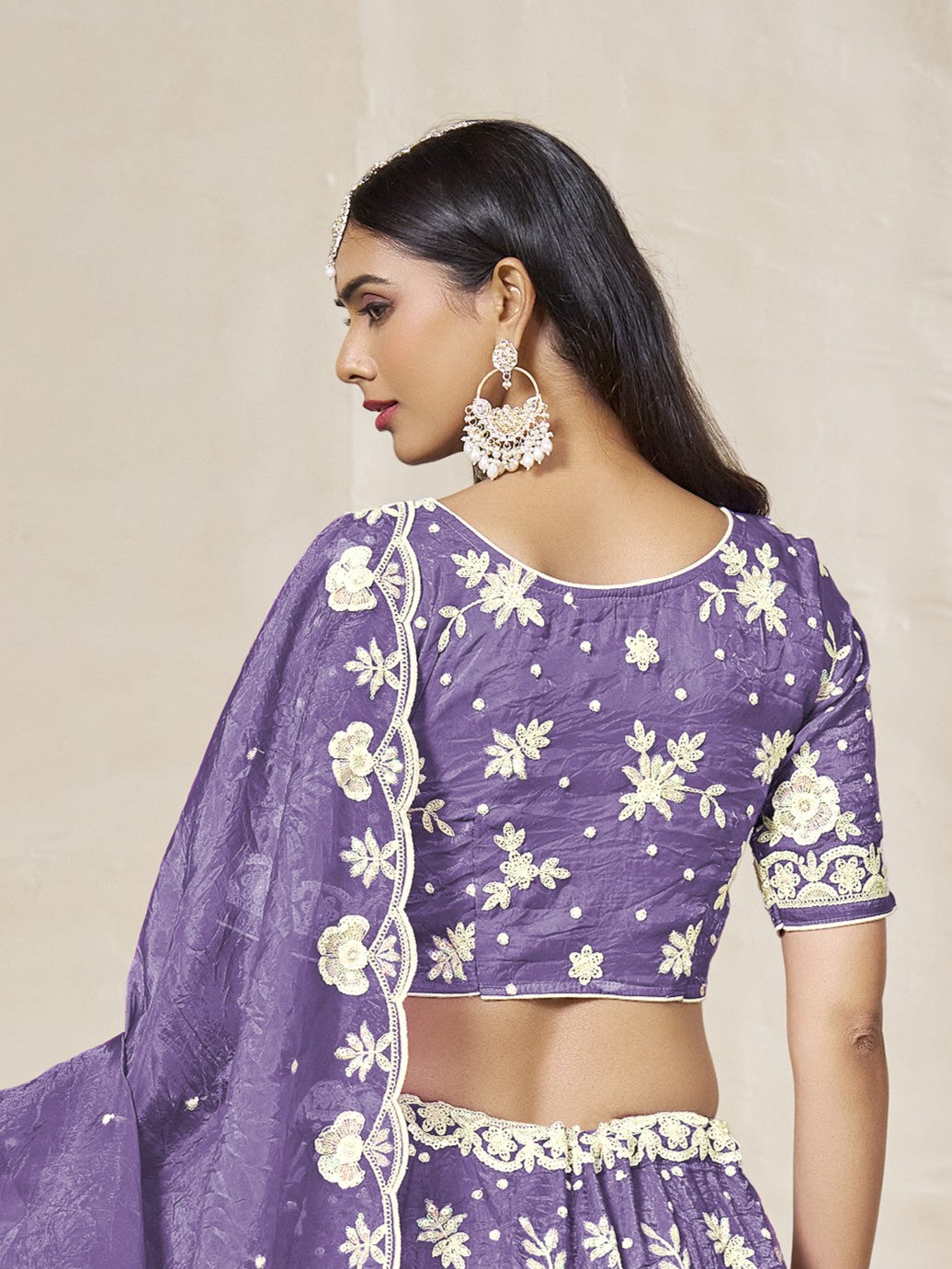 Tarani purple organza lehenga back view highlighting blouse design