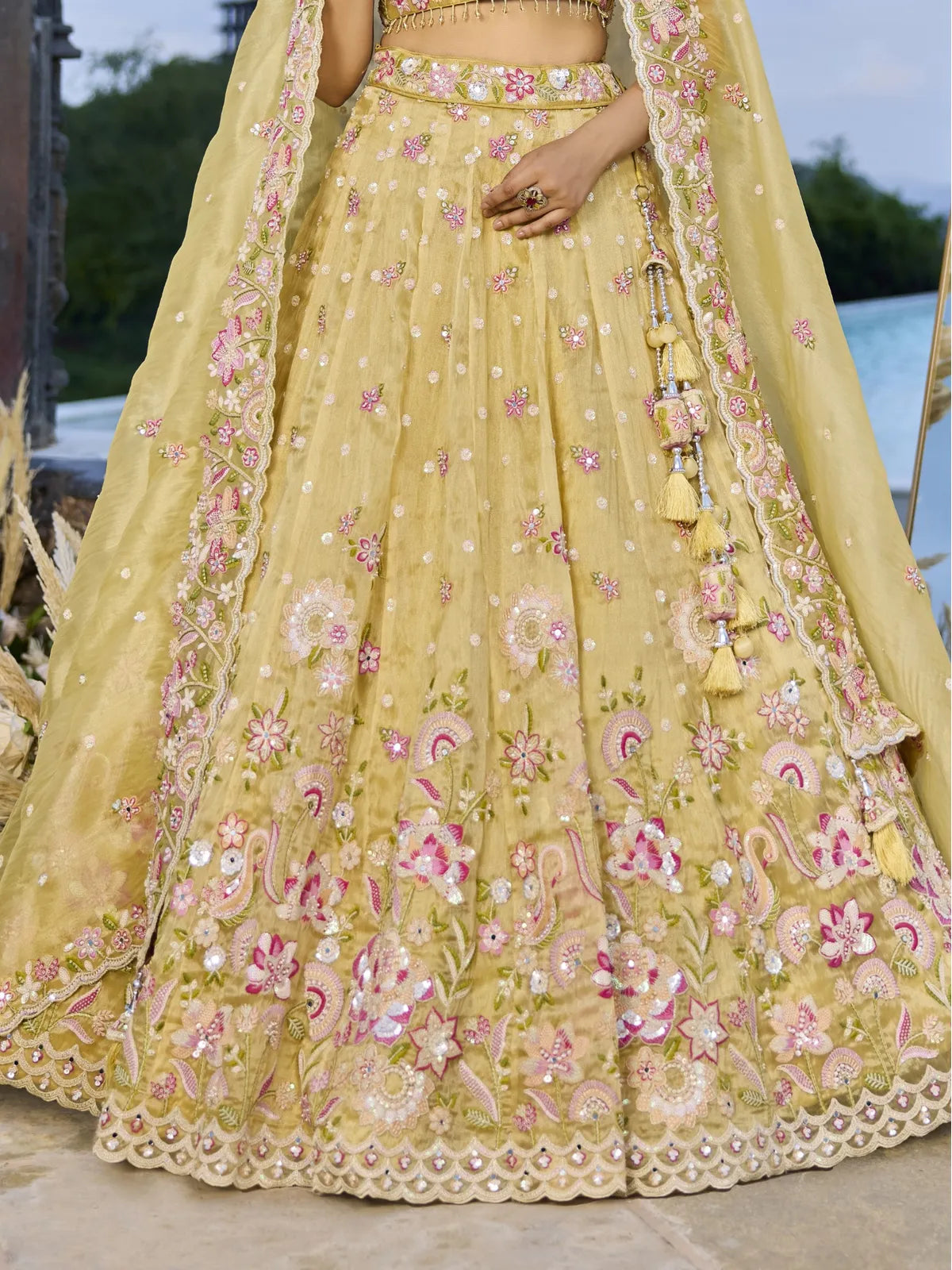 Tarani yellow organza lehenga with floral embroidery front view