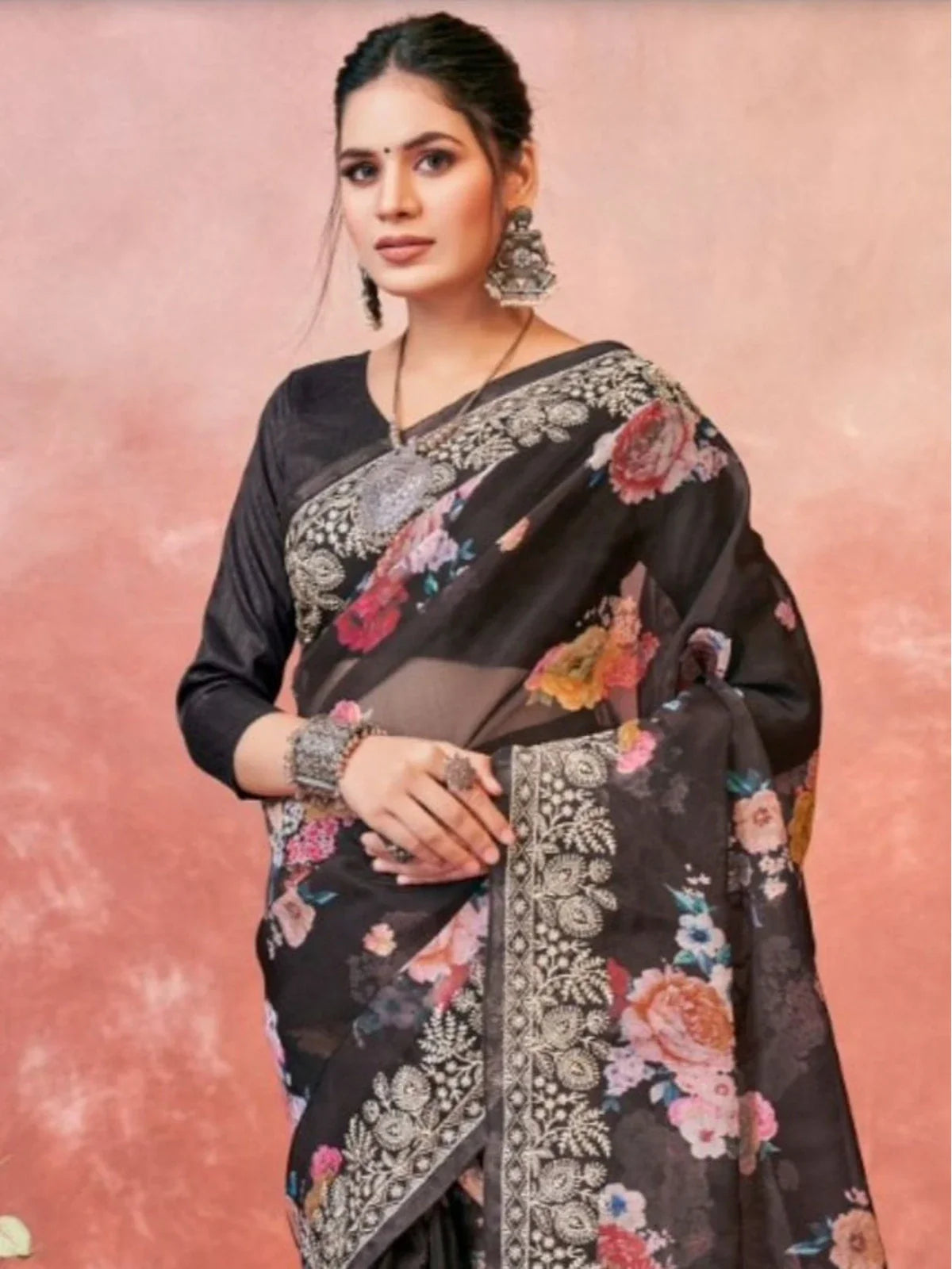 Tarani stylish black organza saree upper body view with floral print and silver border