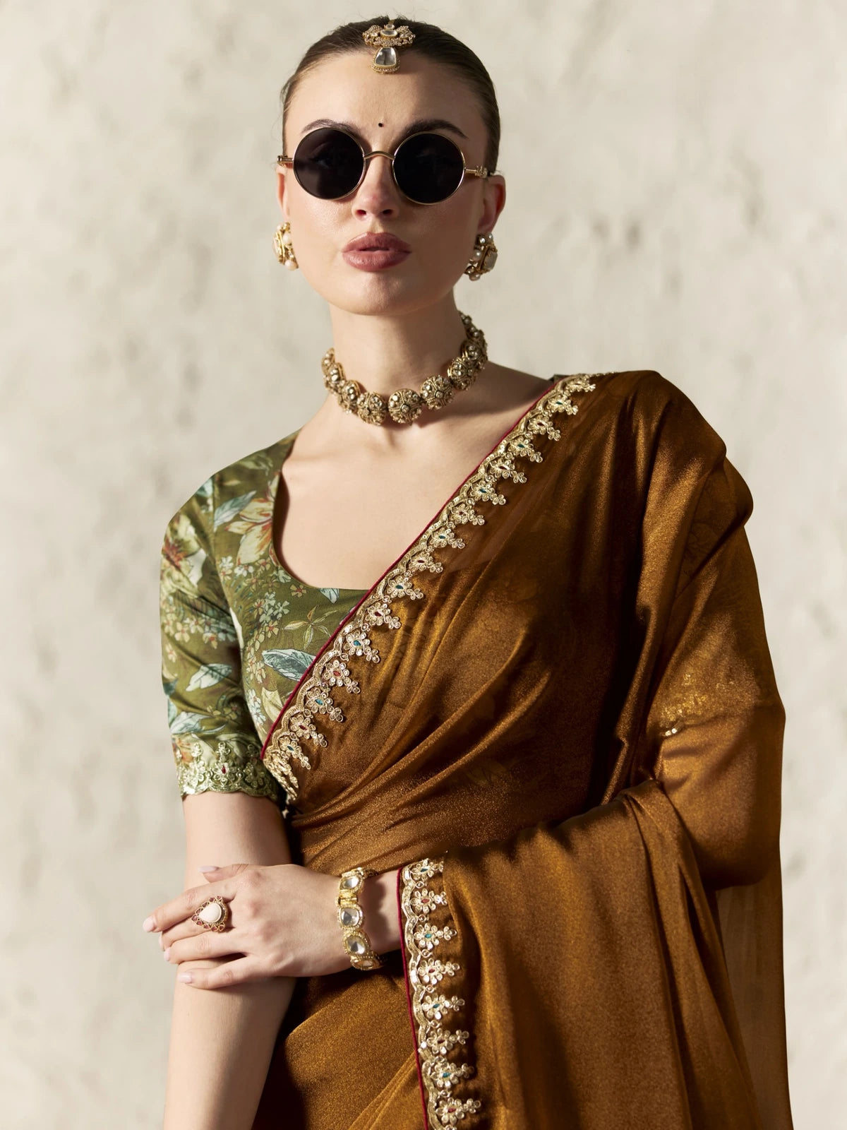 Tarani brown glass tissue saree upper body view with sequins embroidery and floral blouse