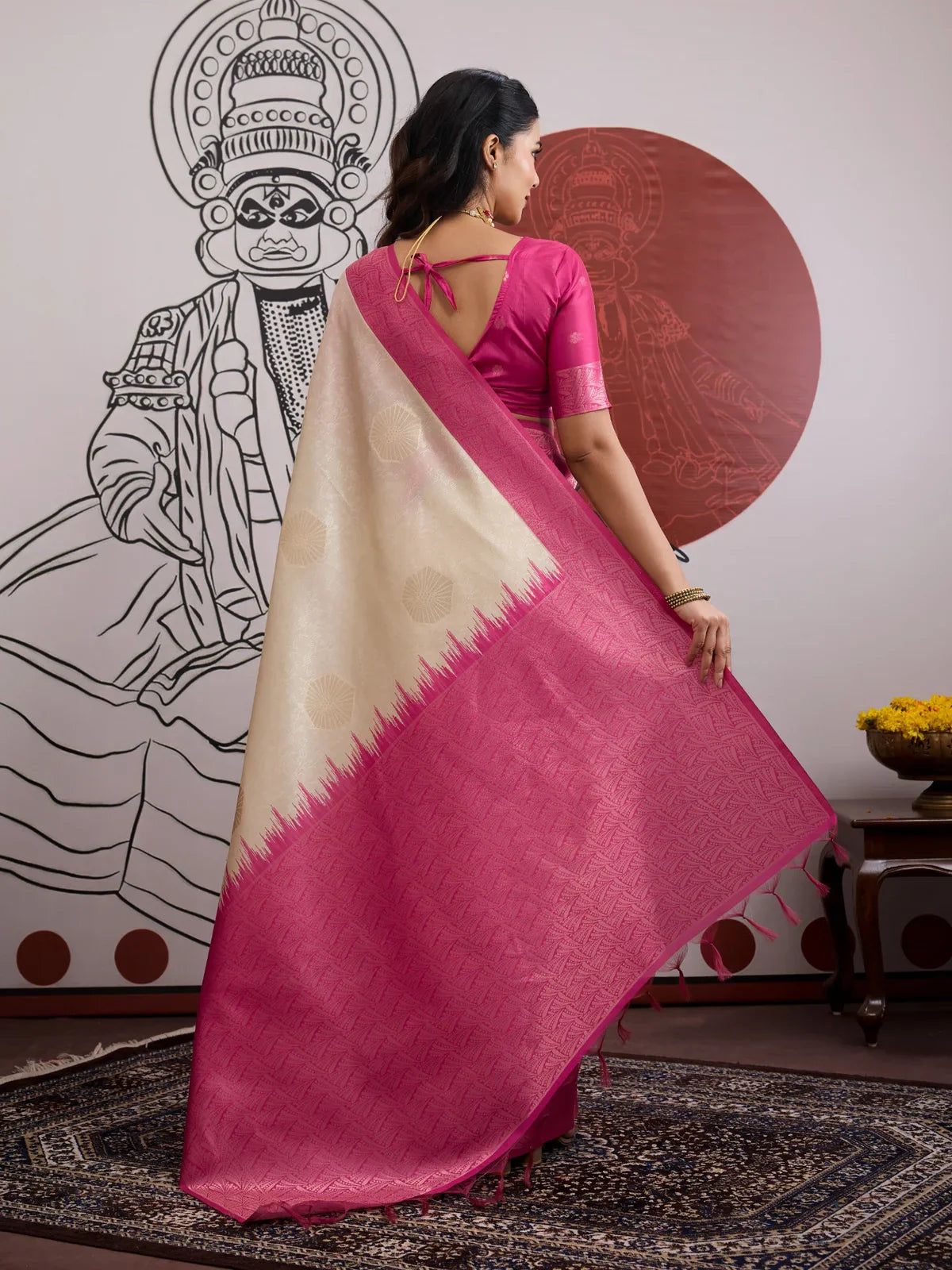 Back view of Tarani handloom paper silk saree showing pallu design and blouse tie-up