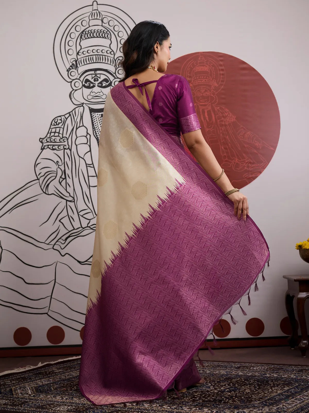 Back view of Tarani paper silk saree with plum pallu and elegant drape