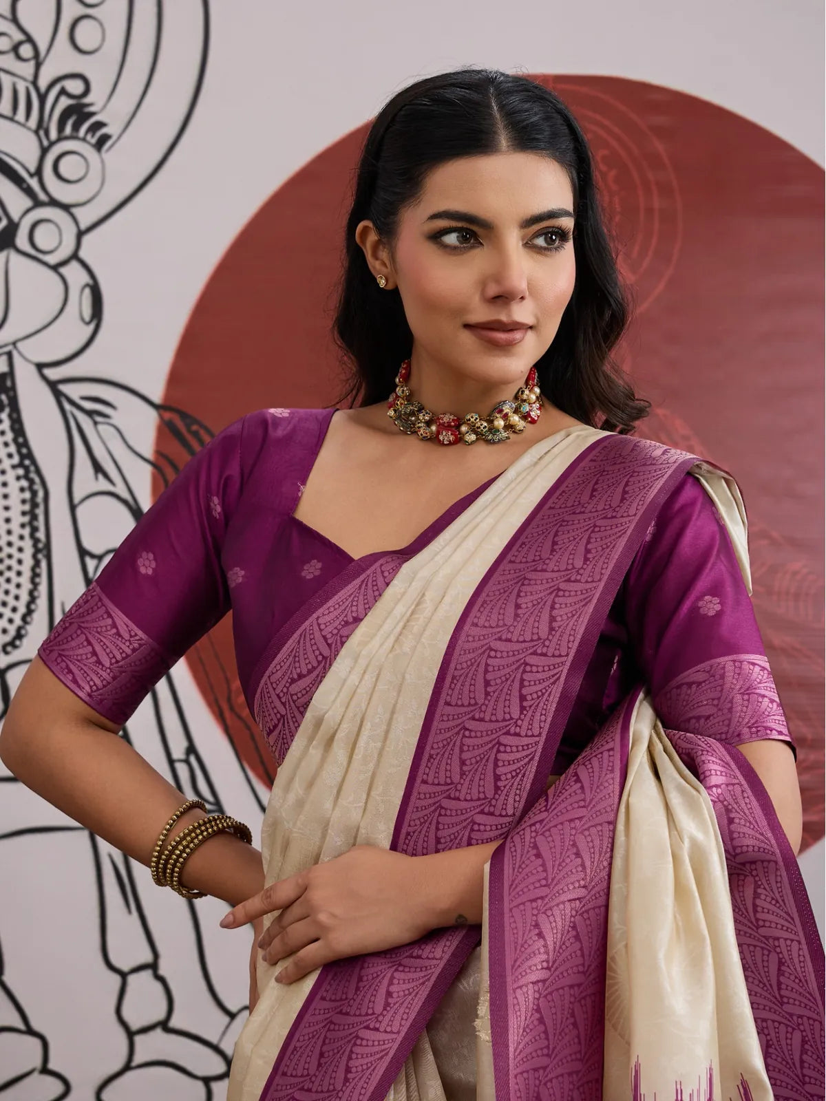 Tarani cream paper silk saree upper body view with rich purple blouse and border