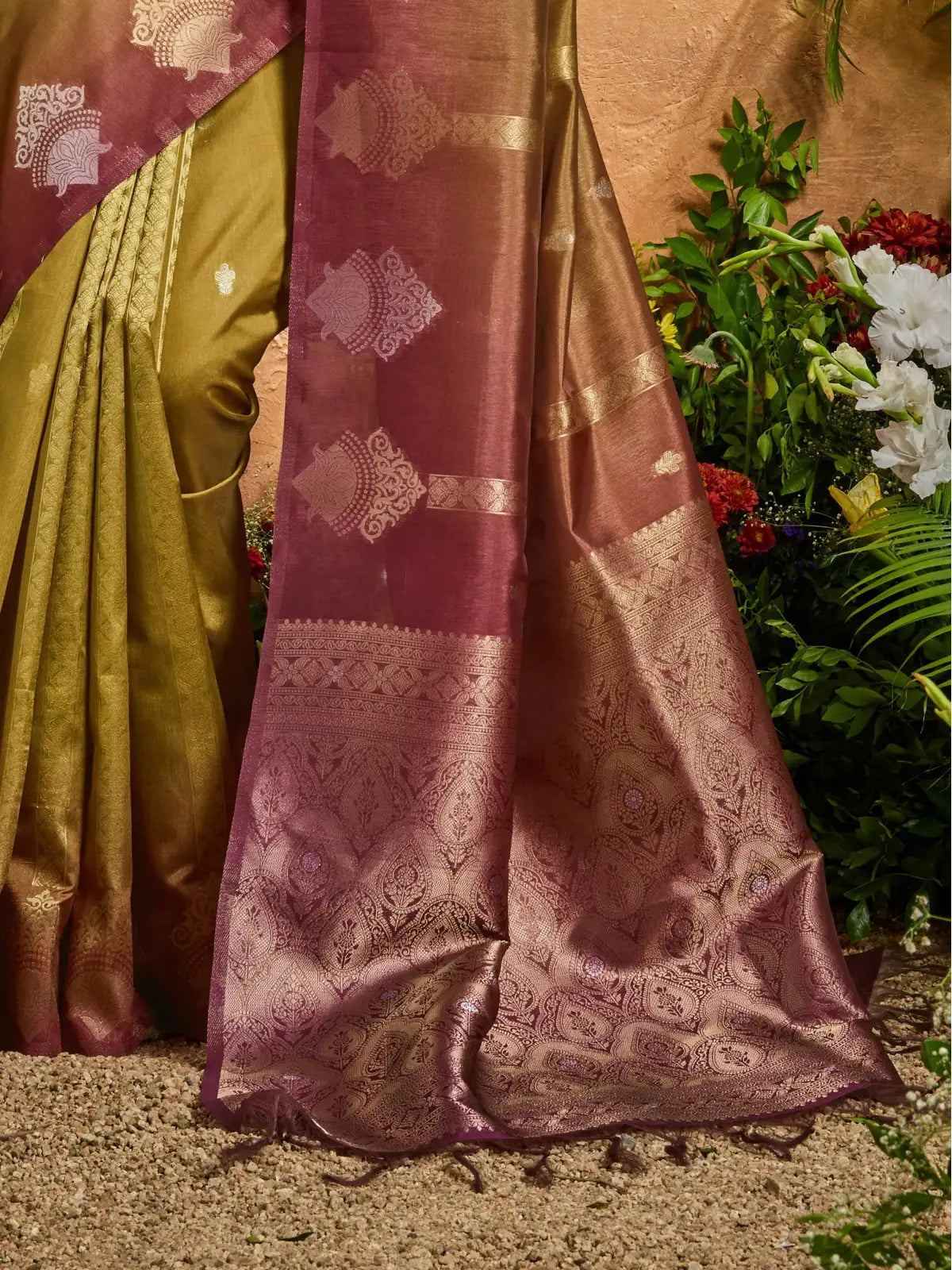 Tarani woven paper silk saree with rich pallu and zari butta in green and wine tones