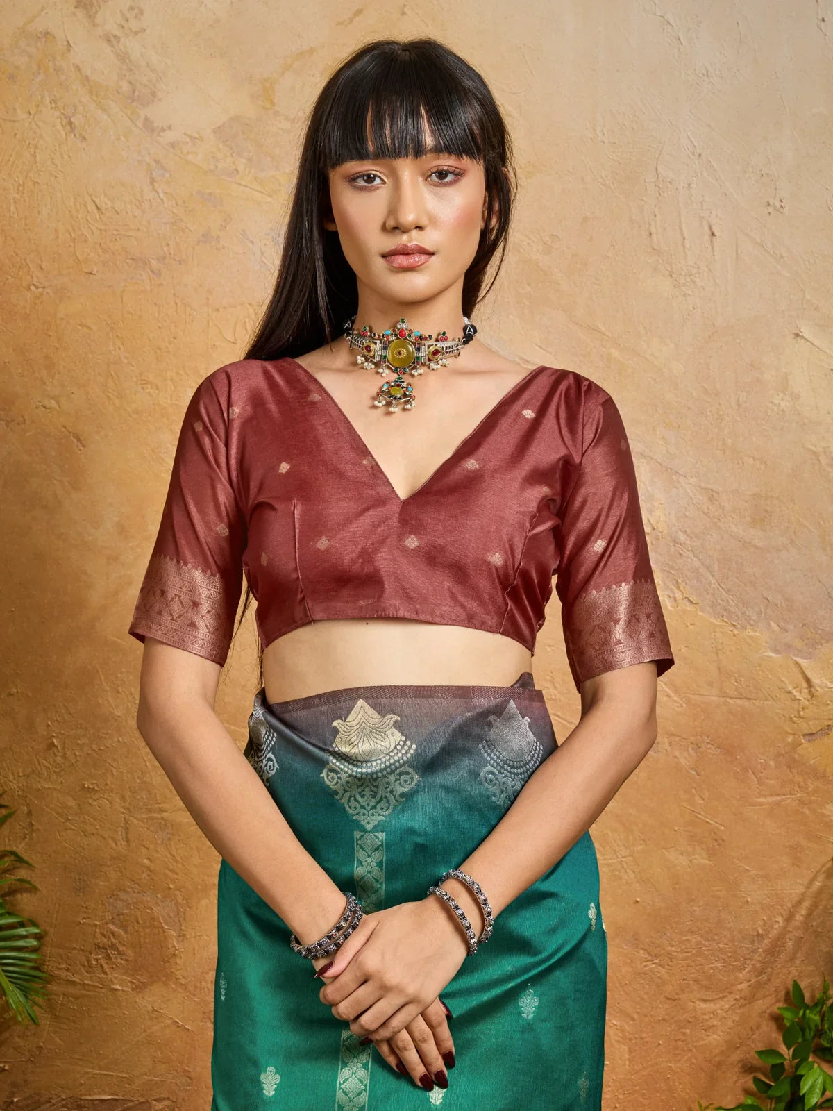 Tarani green paper silk saree upper body view with maroon blouse and choker