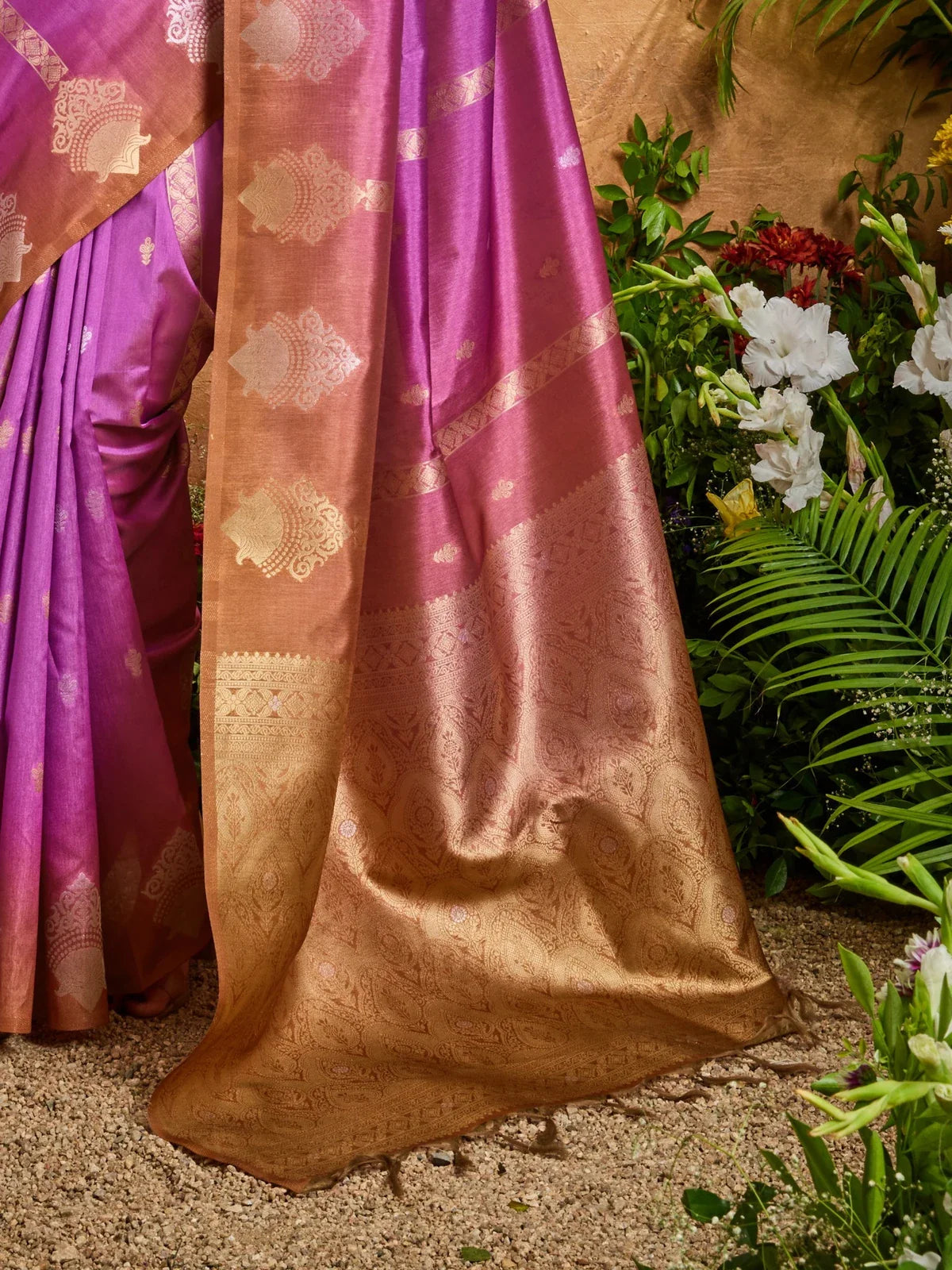 Tarani purple paper silk saree close pallu view with golden woven motifs and border detailing