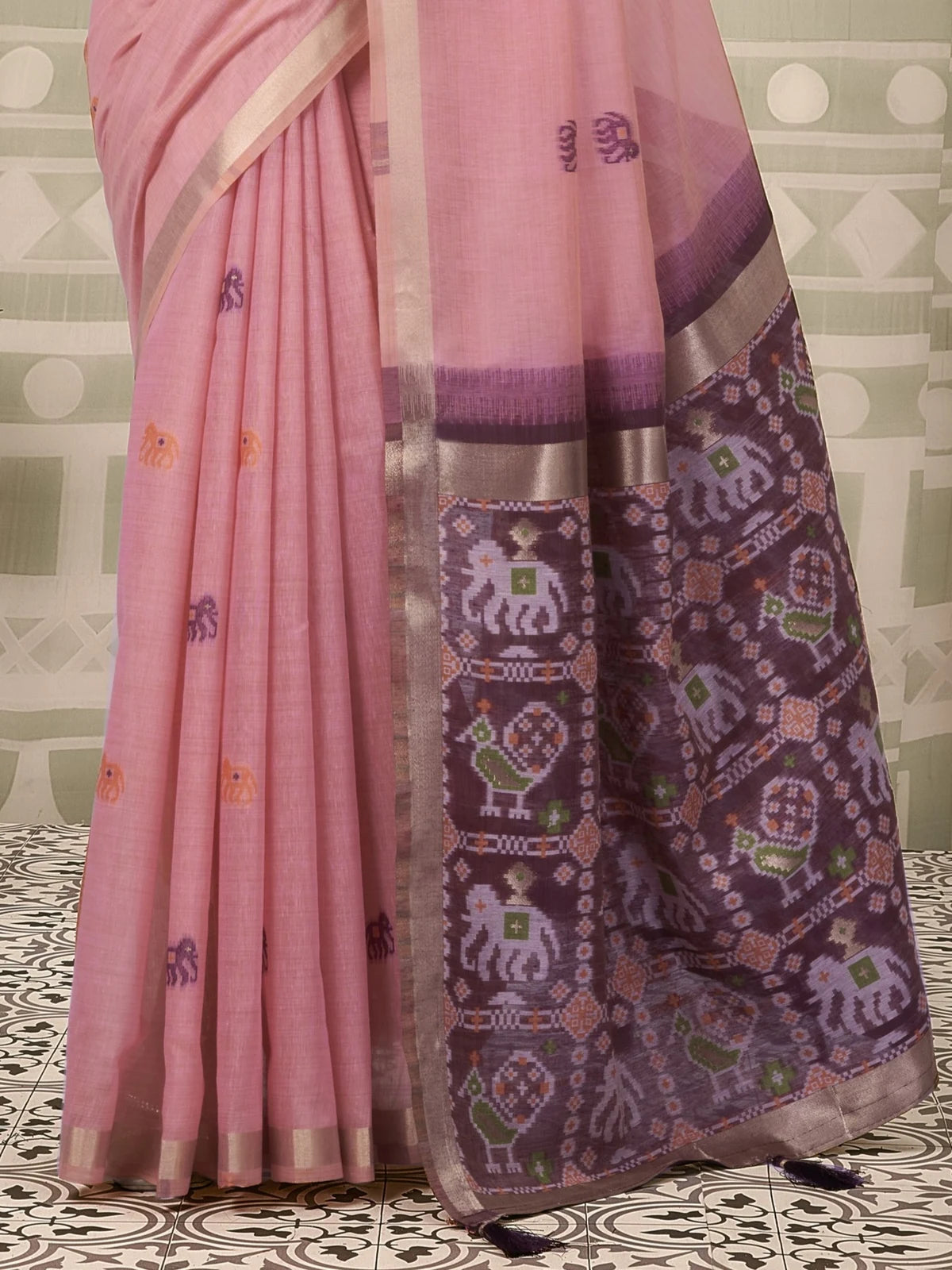 Tarani pink Patola saree pallu view with woven zari border and fancy tassels