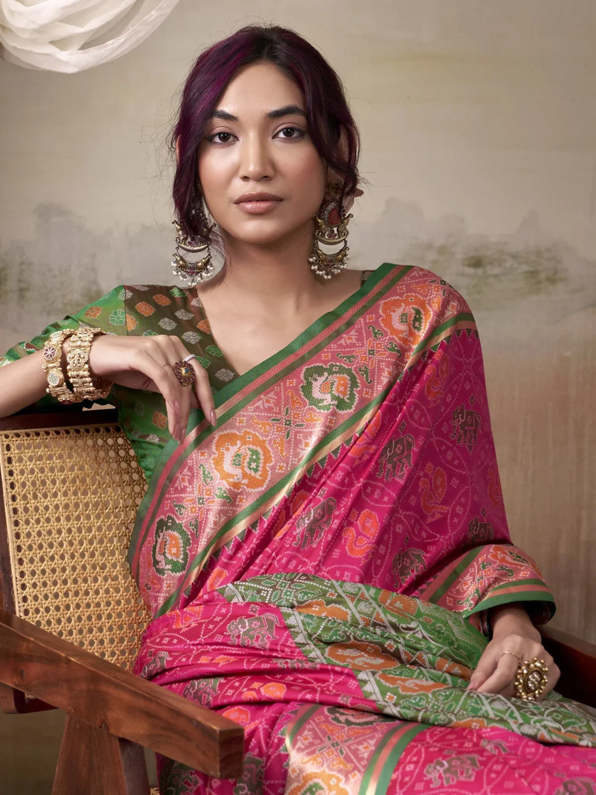Tarani patola silk saree in pink front view with elegant woven blouse