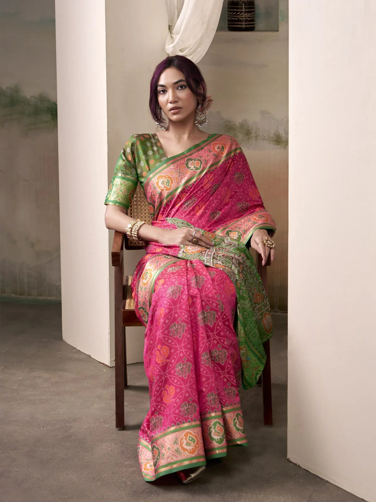 Tarani festive patola silk saree in pink with woven blouse upper body pose