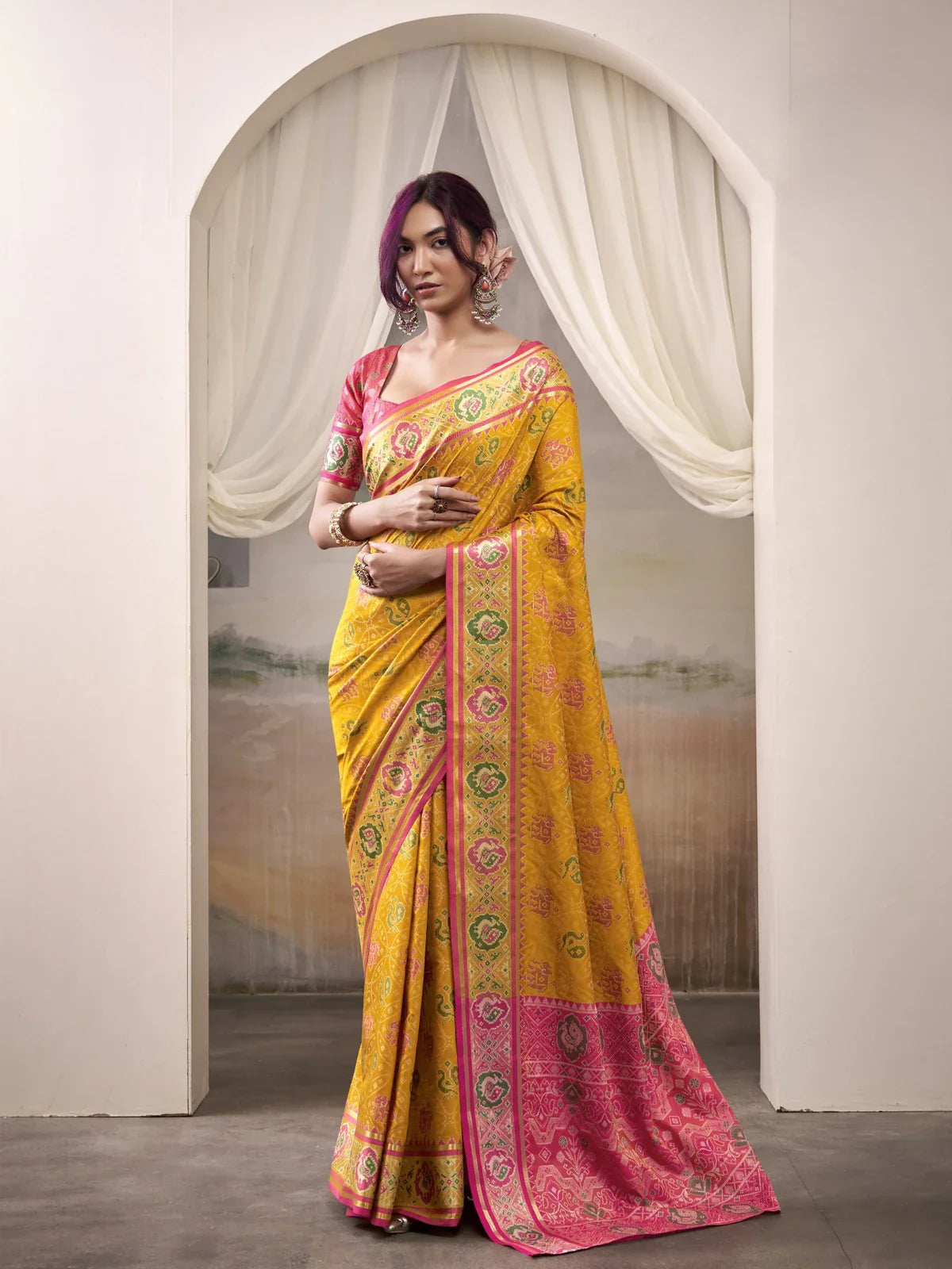 Tarani patola silk yellow saree front view showing pallu and intricate woven detailing