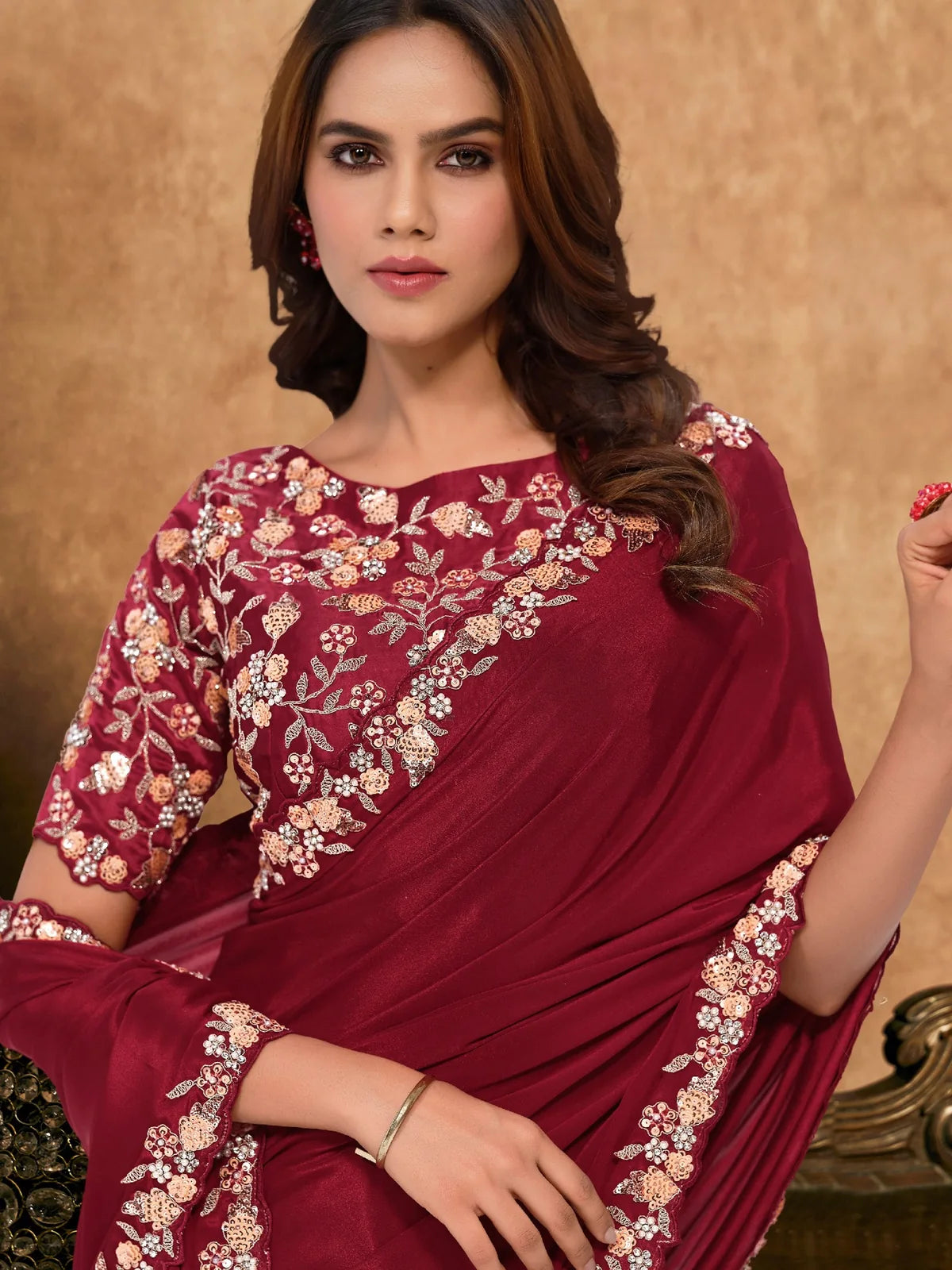 Tarani Jinala maroon saree upper body view with embroidered blouse and elegant border detailing