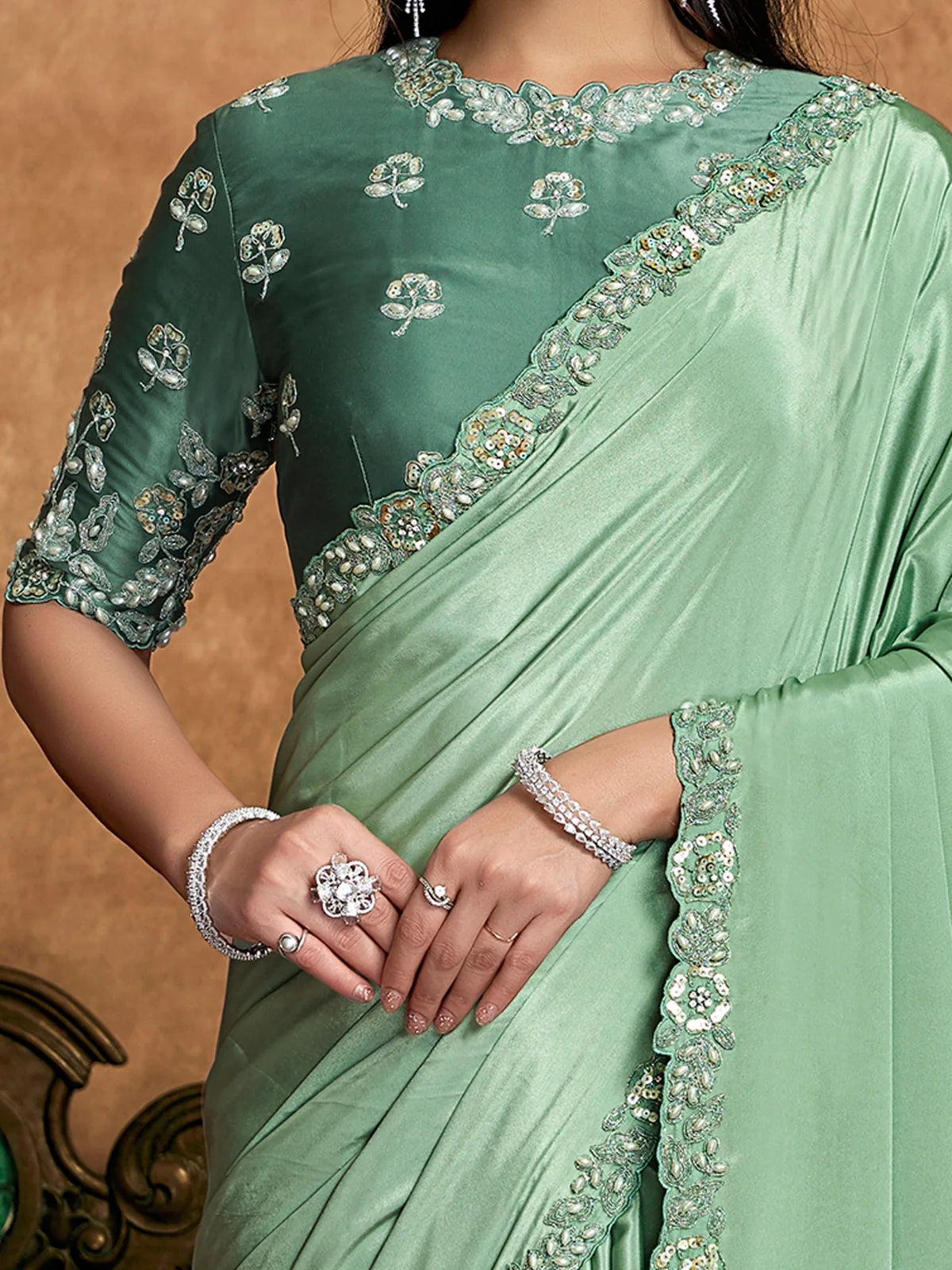 Tarani Durvanka green saree closeup view showing hand embroidery sequin pearl and stone detailing